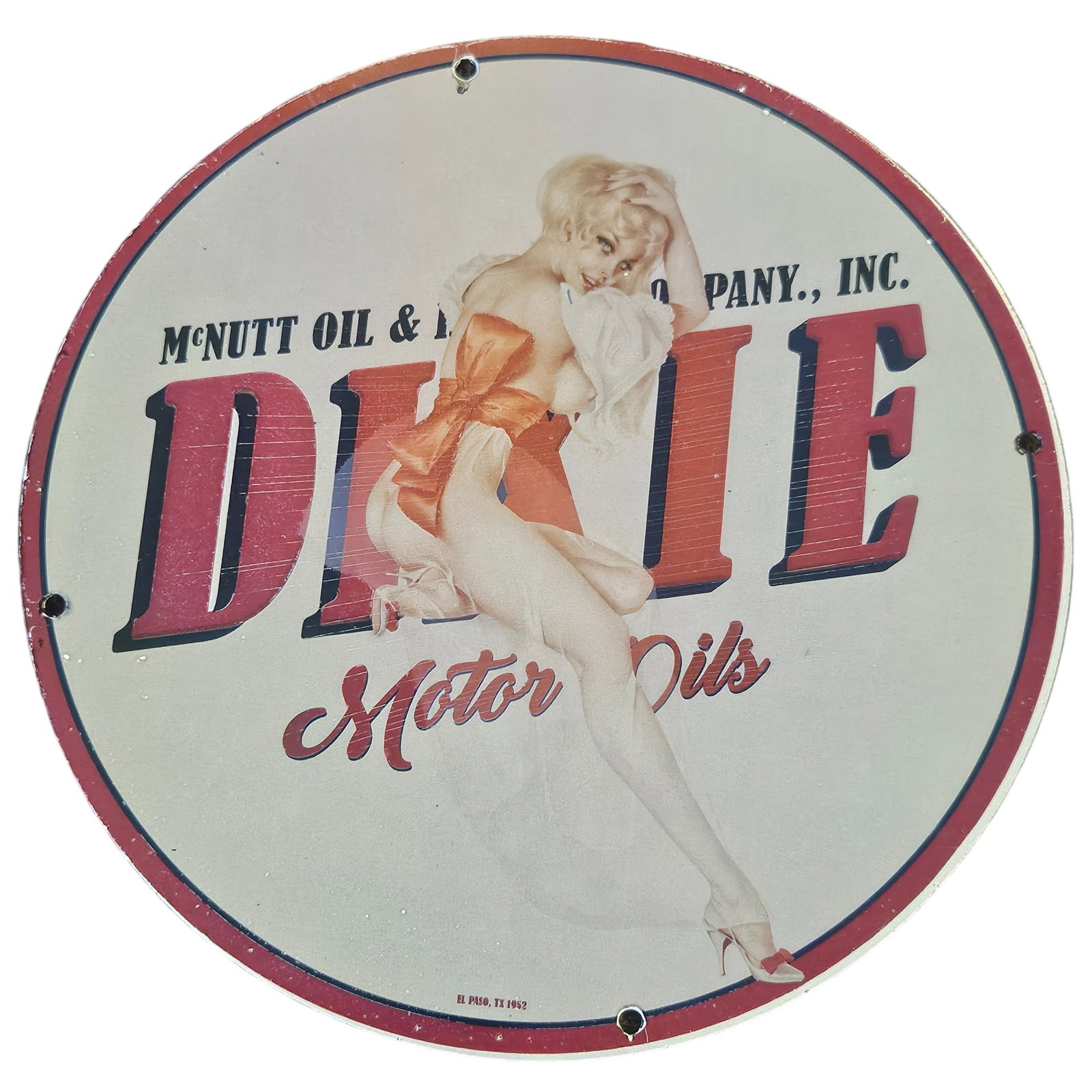Vintage McNutt Oil Co. Porcelain Sign - Dixie Motor Oils with Pin-Up Art: Step into the alluring world of classic Americana with this exquisite vintage porcelain sign from McNutt Oil & Motor Company, prominently featuring the brand name 'DIXIE' alongside the enchanting tagl