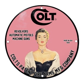 Vintage Colt Firearms Sign Featuring Iconic Pin-Up Girl and Bold Typography