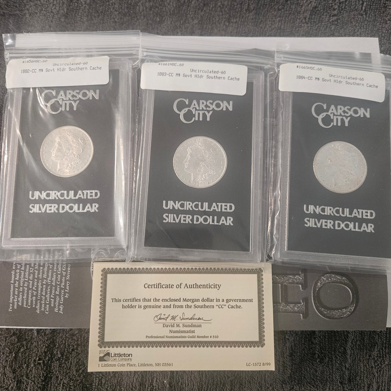 Rare Carson City Uncirculated Silver Dollar Set - 3 Vintage Coins with COA: Explore the beauty and historic significance of this remarkable set of Carson City Uncirculated Silver Dollars. This collection consists of three exquisite coins, each meticulously preserved to showca