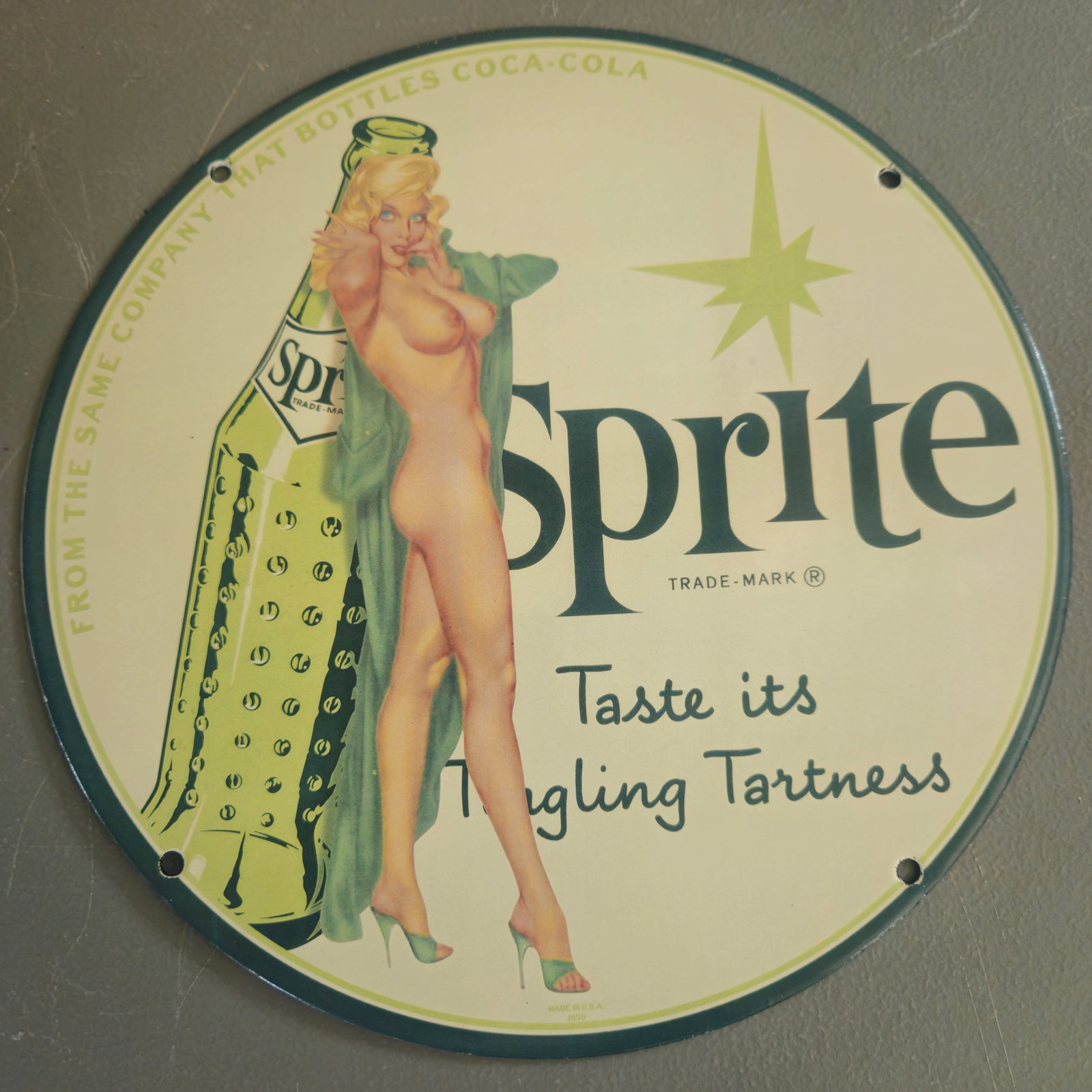 Vintage Sprite Porcelain Sign - Taste Its Tingling Tartness - Collectible Advertising Art: This exquisite porcelain sign from the iconic Sprite brand is a rare collectible that captures the essence of mid-20th century advertising. Featuring a captivating and artistic depiction of a woman al