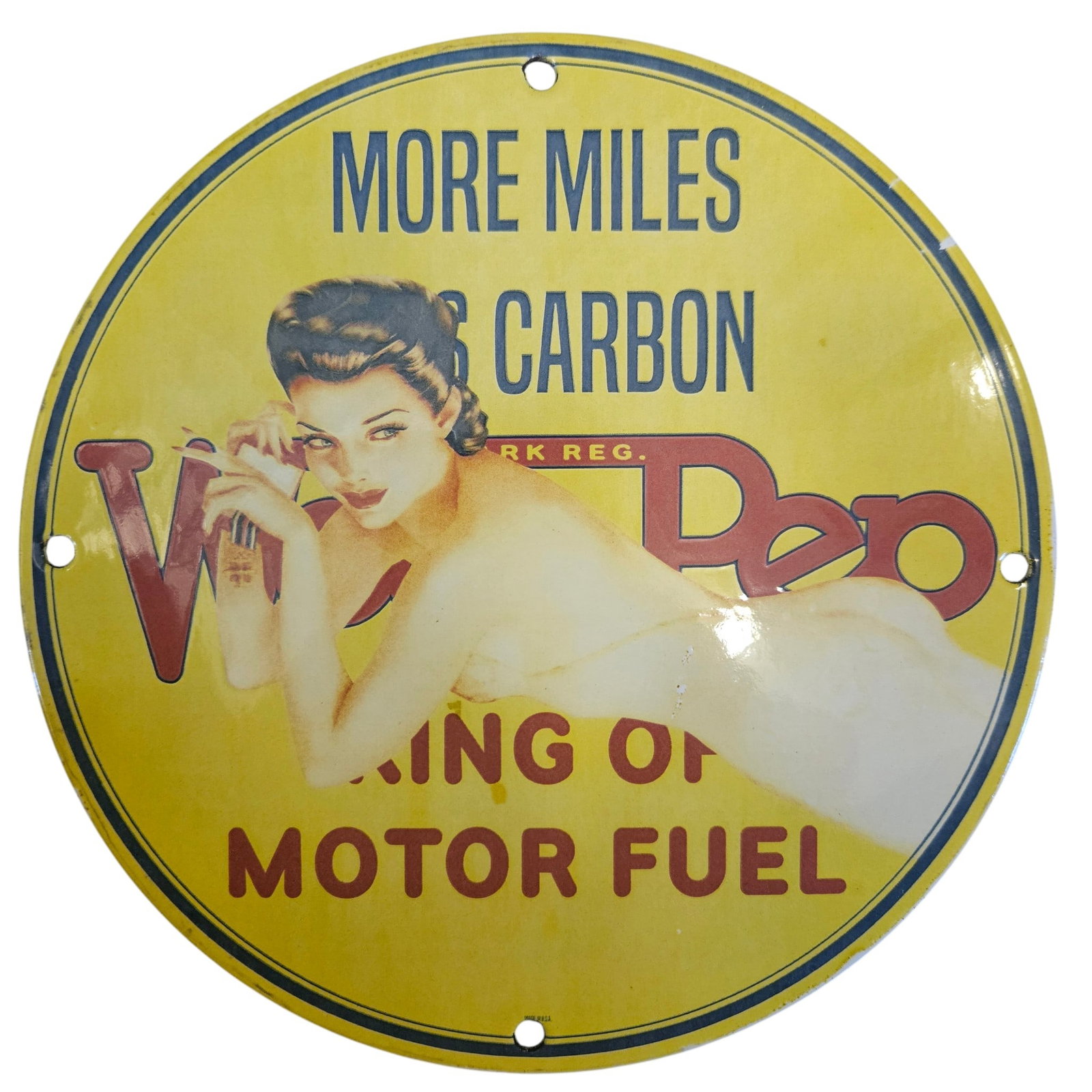 Vintage Porcelain Sign: 'More Miles & Carbon' - Classic Motor Fuel Advertising: This exquisite vintage porcelain sign, boldly emblazoned with the phrase 'More Miles & Carbon', is a stunning example of mid-20th century advertising artistry. The vibrant yellow backdrop serves to ac