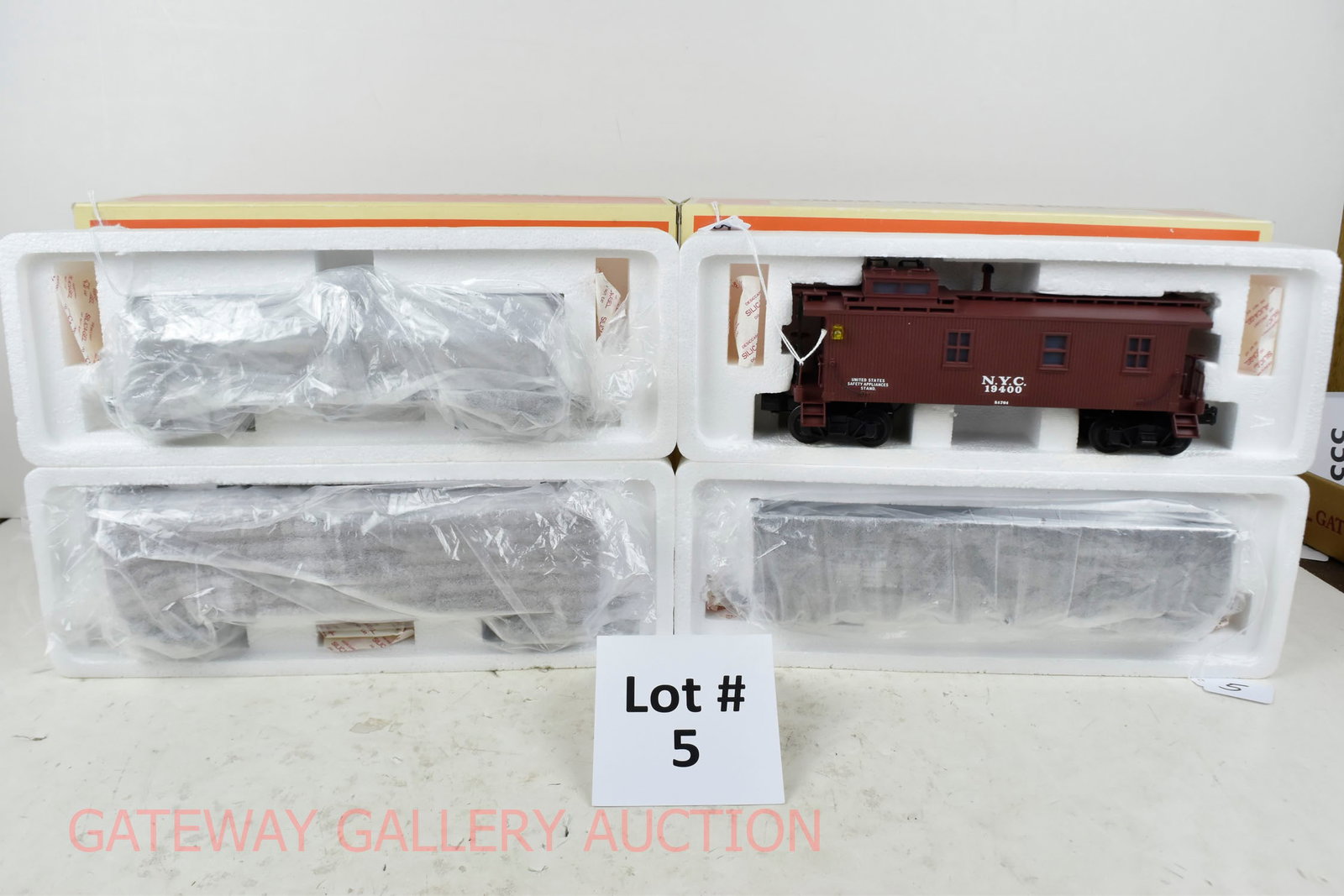 Modern Lionel:: 51501 B&O Die-Cast Hopper, 51701 NYC Die-Cast Caboose, 51300 Die-Cast Shell Tanker, 51401 Die-Cast PRR Boxcar OB