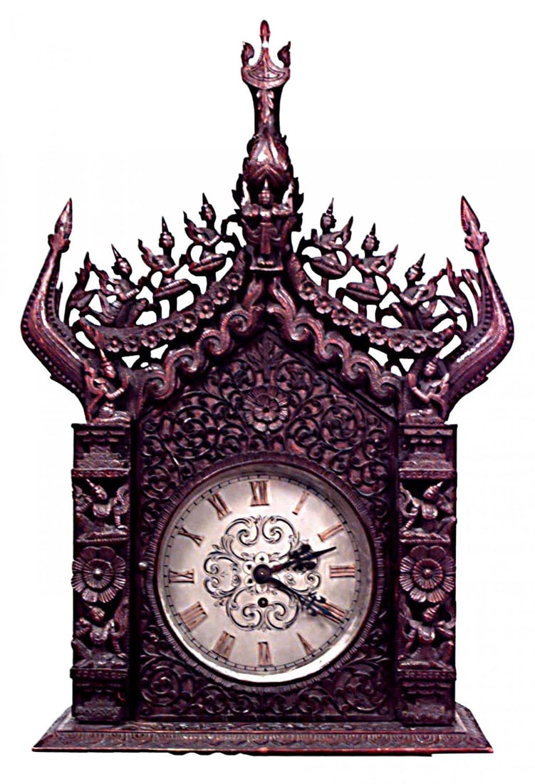 Burmese Rosewood Grandfather Clock: Asian Burmese-style (19th Century) rosewood carved and filigree grandfather clock. (Not working)Dimensions: 22.5"w x 16"d x 100.5"h