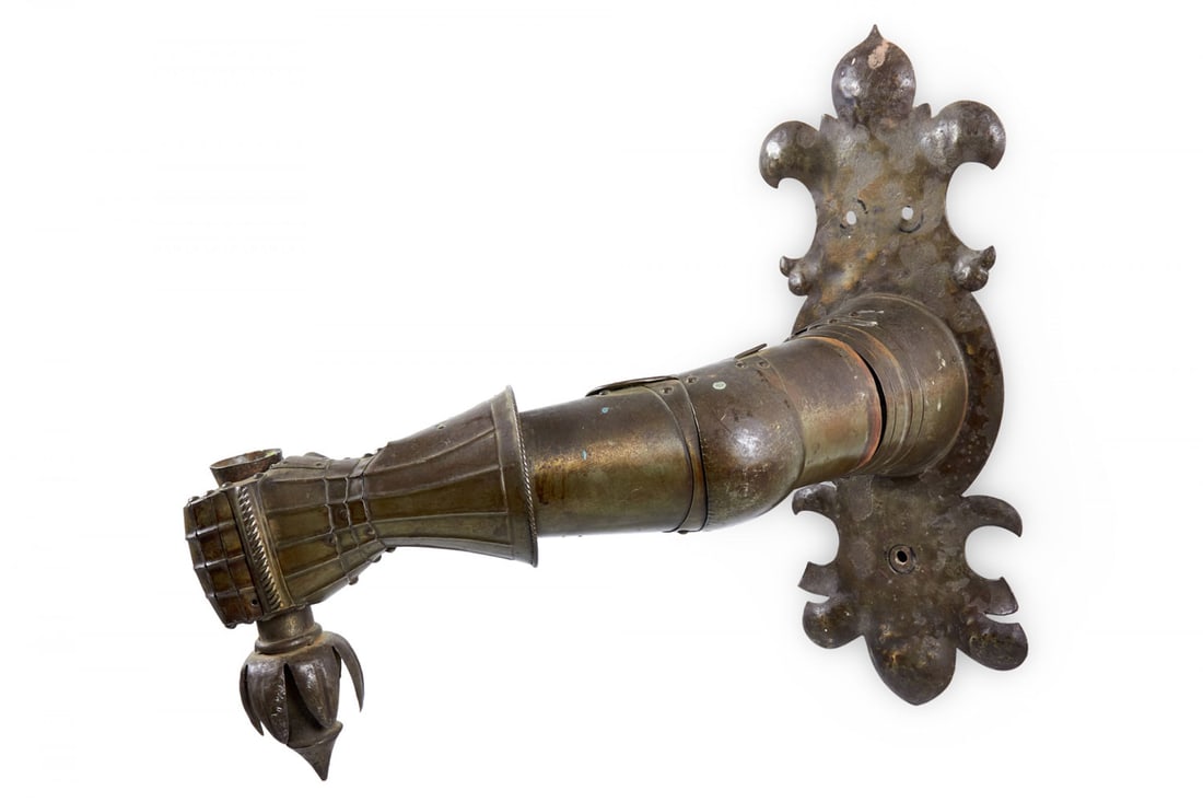 Italian Renaissance Style Metal Armored Arm Shaped Wall Sconce: Italian Renaissance-style (19th Century) metal wall sconce shaped like an arm in armor holding a torch.Dimensions: 20"w x 24"d x 24"h