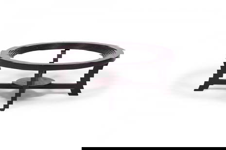 Paul Frankl for Brown Saltman Art Deco Ebonized Stepped Circular Cocktail / Coffee Table Frame: American Art Deco circular ebonized wooden coffee / cocktail table frame with a stepped interior and a stretcher base with small circular bottom shelf (PAUL FRANKL FOR BROWN SALTMAN). Missing glass to