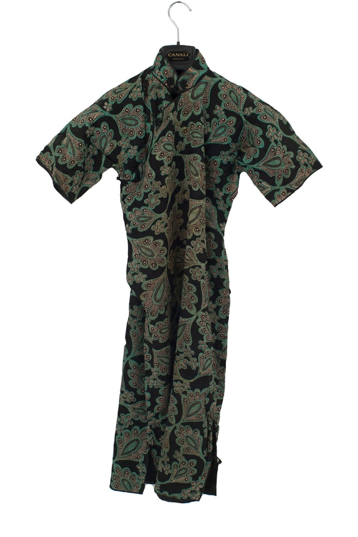 Vintage Chinese Dress: Vintage black synthetic fabric small Chinese dress with a green and beige pattern, short sleeves, and frog closures at the neckDimensions: 16"w x 15"d x 42"h
