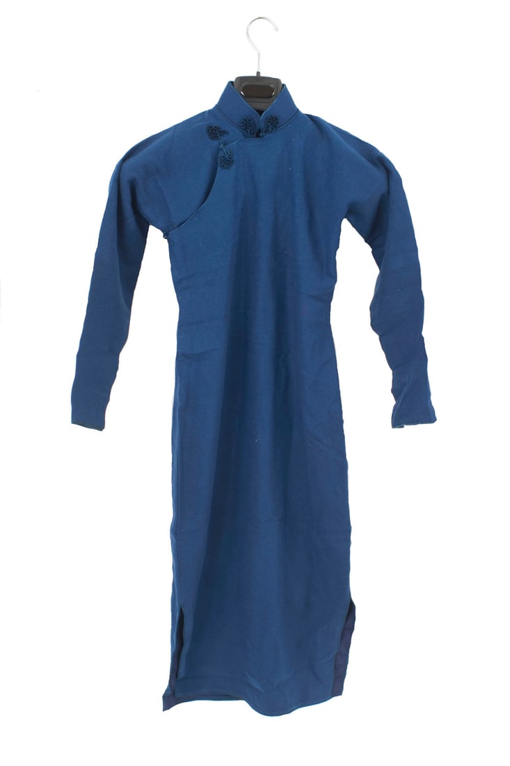 Vintage Chinese Dress: Vintage dark blue synthetic fabric small Chinese dress with long sleeves and a frog closure at the neckDimensions: 15"w x 15"d x 42"h