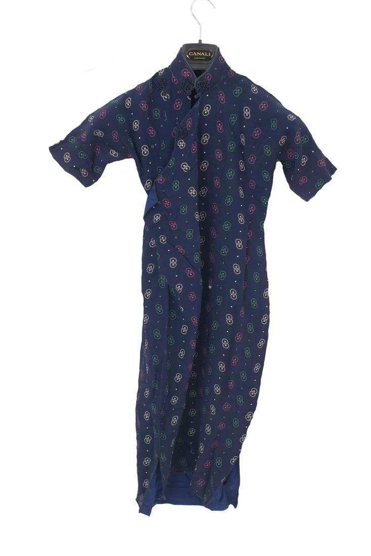 Vintage Chinese Dress: Vintage dark blue synthetic fabric small Chinese dress with long sleeves, a yellow, red, and green interlocked circle pattern, and a frog closure at the neckDimensions: 15"w x 15"d x 41"h