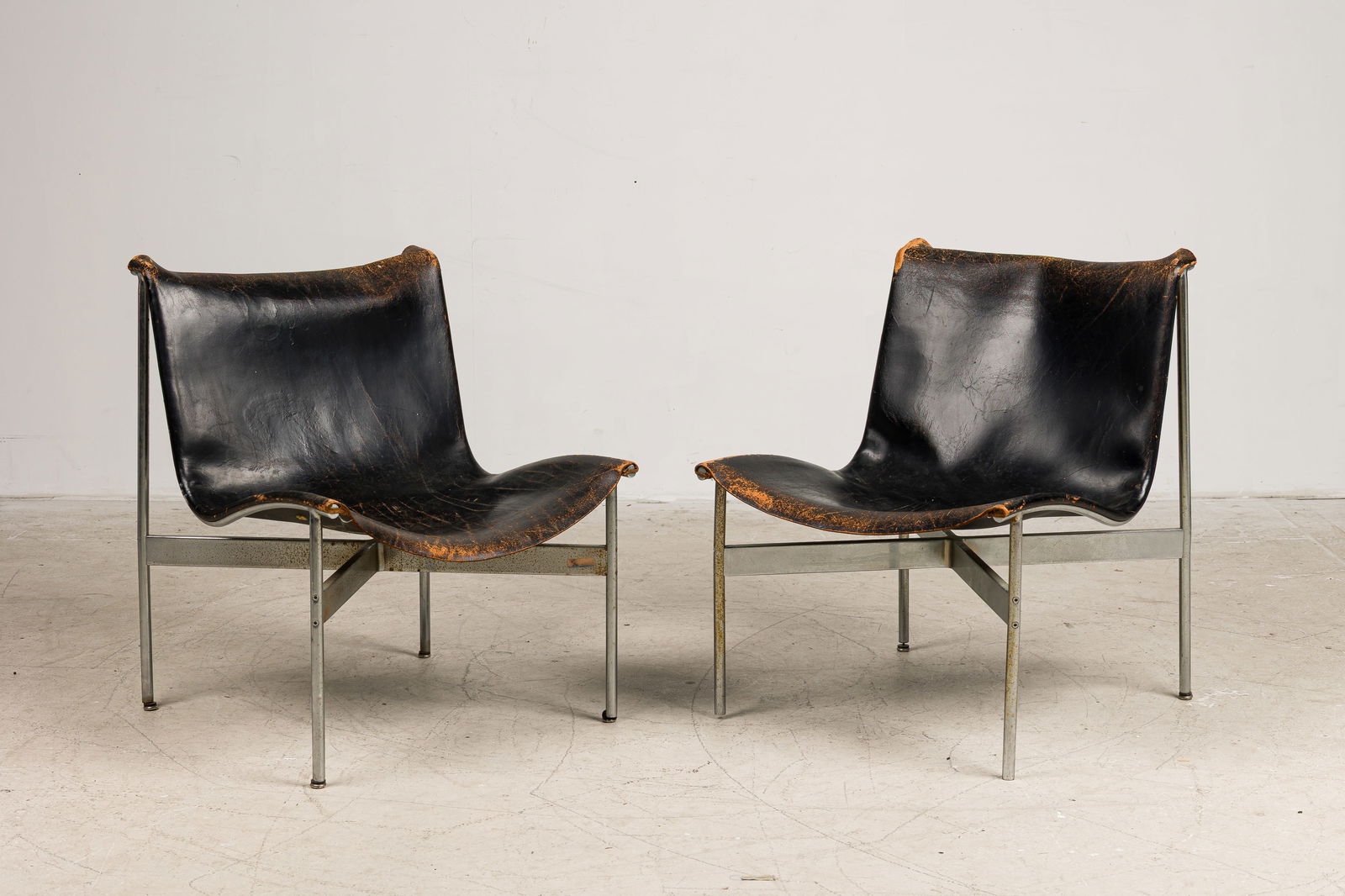 Katavolos, Littell & Kelley, Pair "New York" Chairs: c. 1965, USA, chrome-plated steel, leather sling seat, on X-shaped stretcher, for Laverne International, 29.75"h x 23"w x 25"d