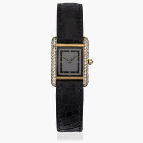 Must The Cartier in Gold Plate Over Silver With Dimonds.
