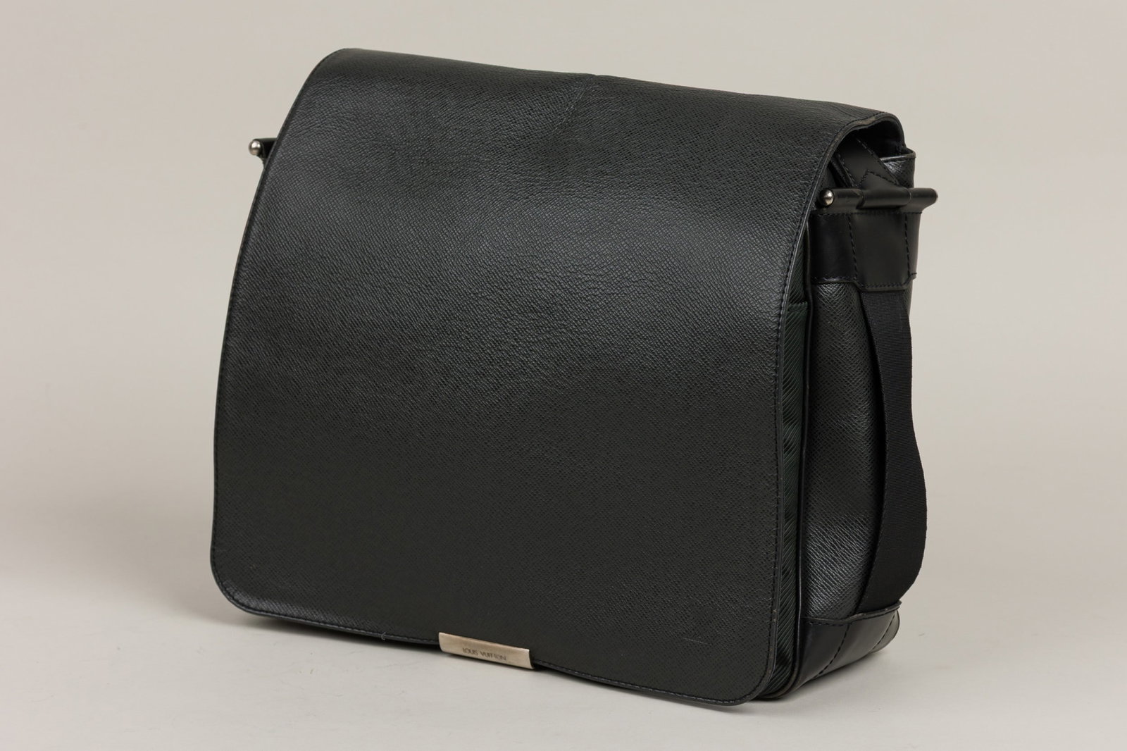 Louis Vuitton Taiga Victor Crossbody Bag: Brand: Louis Vuitton Model: Taiga Victor shoulder bag Material: Taiga leather Reference: M30142 Color: Black Hardware: Silver and black ton Date Code: SP0054 (France, 2005) Approx. Dimensions: 11&qu