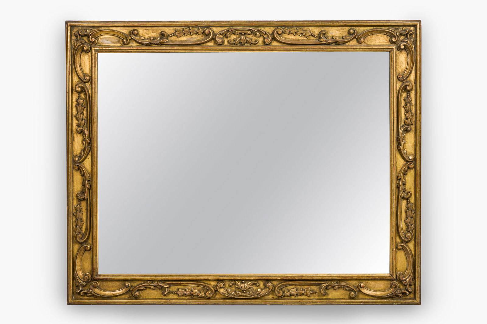 Neoclassical style large ornate gold gilt mirror: c. early 19th c., gilt wood, silvered glass, pine backing, 56.25"h x 45"w x 1.5"d