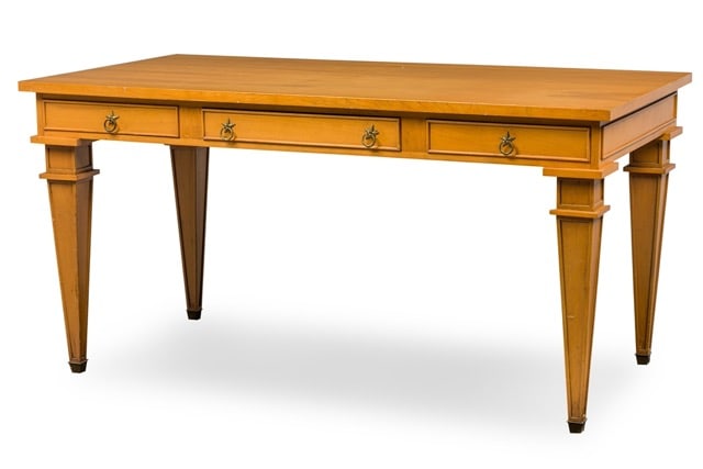 Andre Arbus Mid-Century French Sycamore Desk / Writing Table: 1940s, France, sycamore rectangular desk / writing table featuring 3 front drawers with bronze star-shaped escutcheons, ring pulls, a set of faux drawers on the reverse, standing on 4 tapered square l