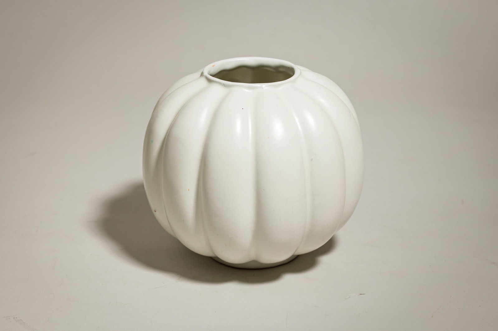 Anna-Lisa Thomson for Upsala Ekeby, lobed vase: c. 1950s, Sweden, melon shaped modern earthenware with vertical ridges,4.5"h x 8"w x 5.5"d Provenance: Modern Design f