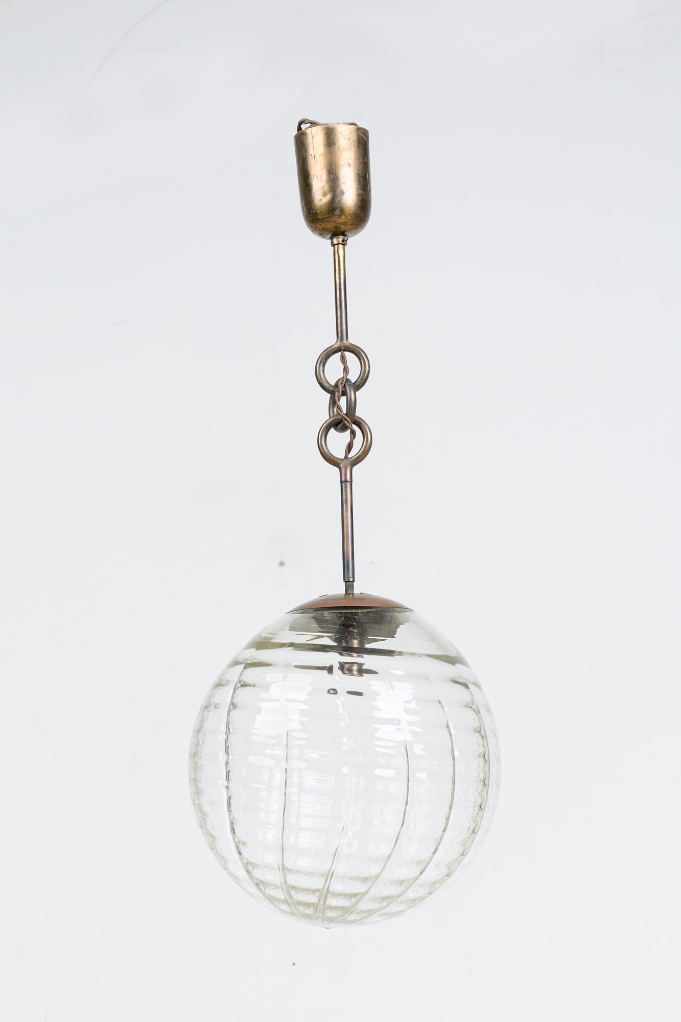 Seguso Vetri d'Arte, Cordonato Globe Pendant: c, 1940s, Italy, clear glass in twisted cord design, 13"dia, 34"h (to canopy) Provenance: Modern Design from a Private Collection, NYC/ Sag Harbor