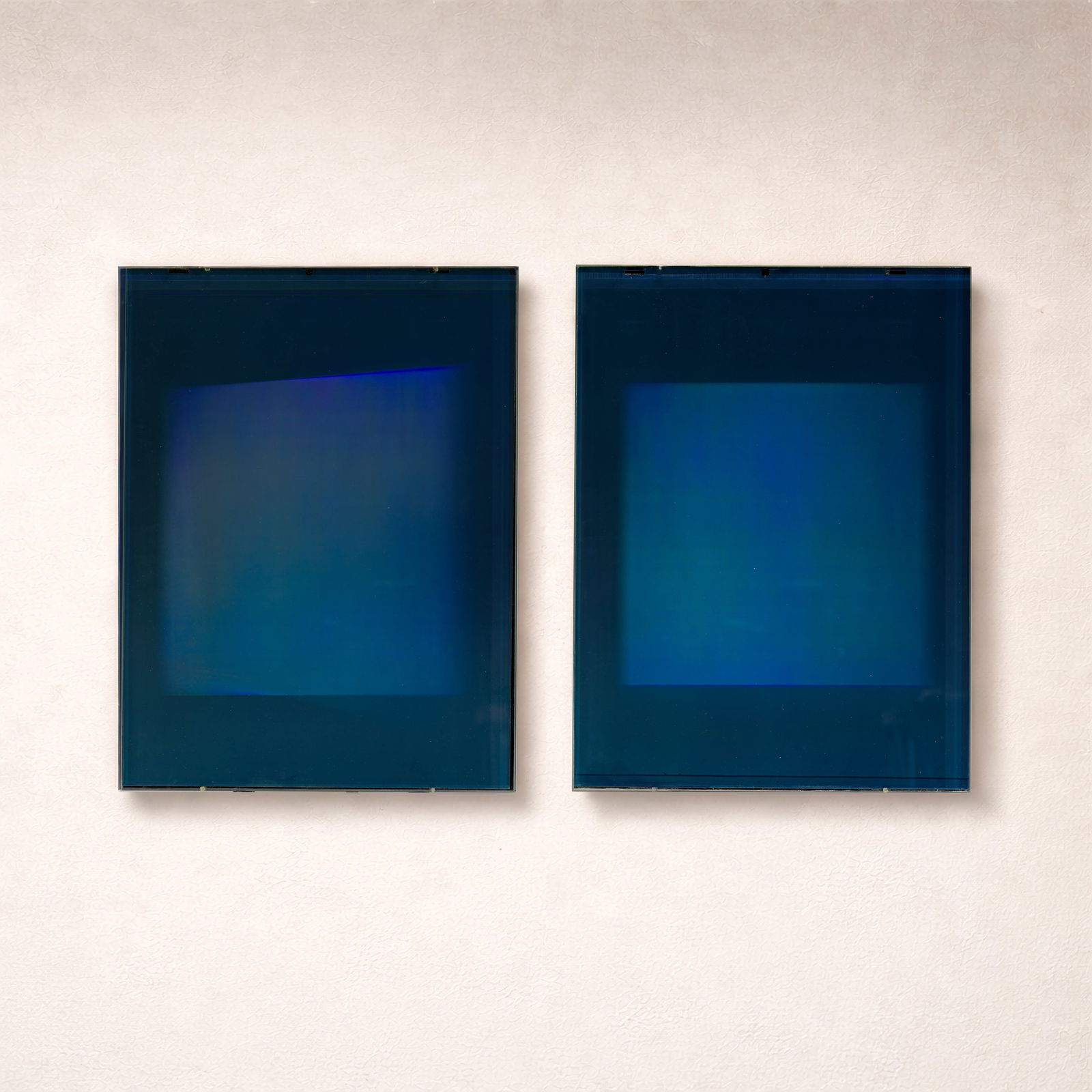 James Turrell, (2) holograms, 1994: James Turrell (American, b. 1943), "OUT", IN/OUT" (Two Works), silver halide emulsion in gelatin based film, laminated to optically clear glass, aluminum hanging brackets, each signed,