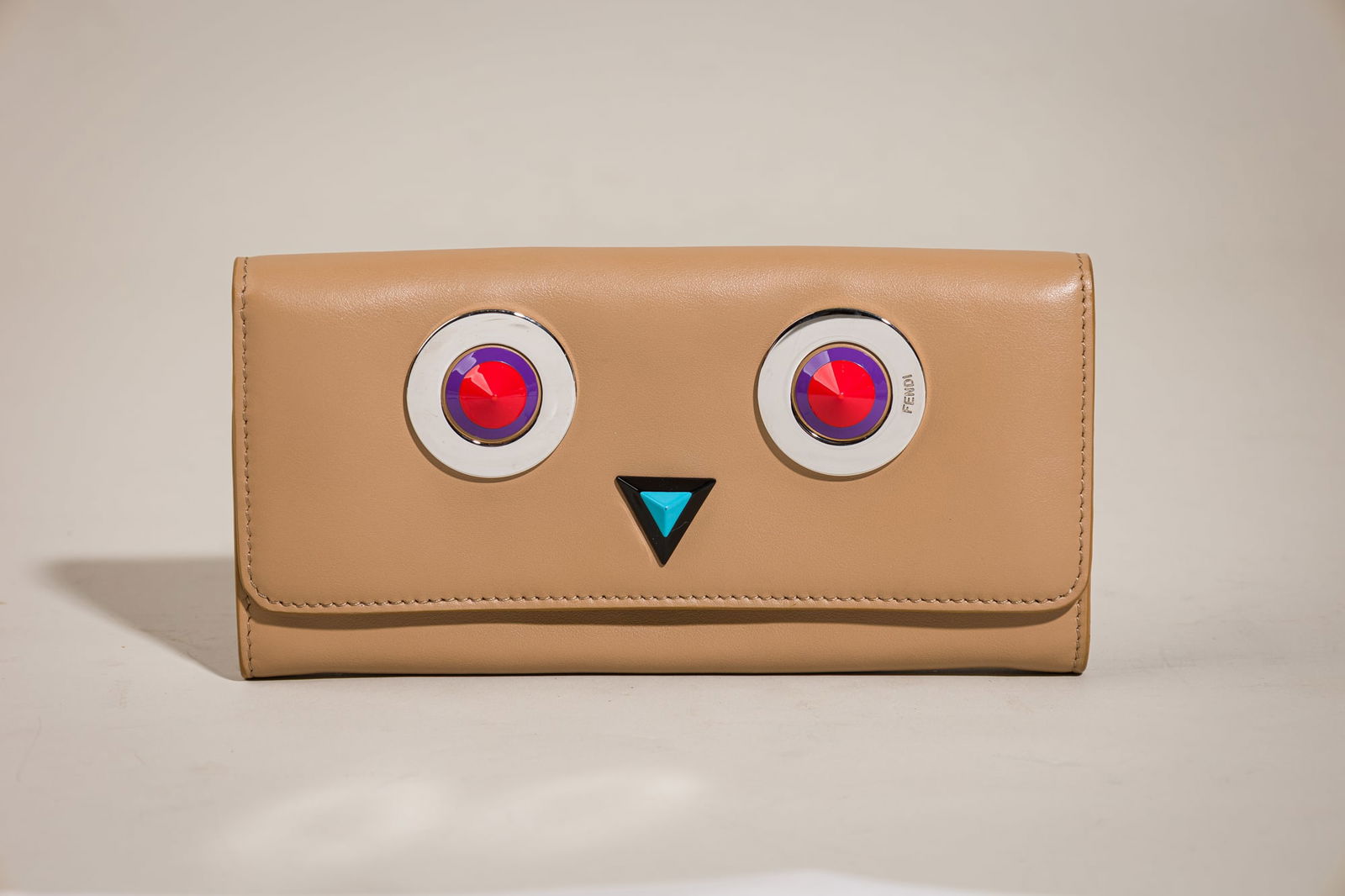 Fendi Hypnoteyes Wallet: Brand: Fendi Material: Leather Color: Beige Date Code: 03014846 Approx. Dimensions: 7.3" L x 3.9" H x 0.9" W Features: BI-fold style, card slots, bill compartment, coin pocket Conditio