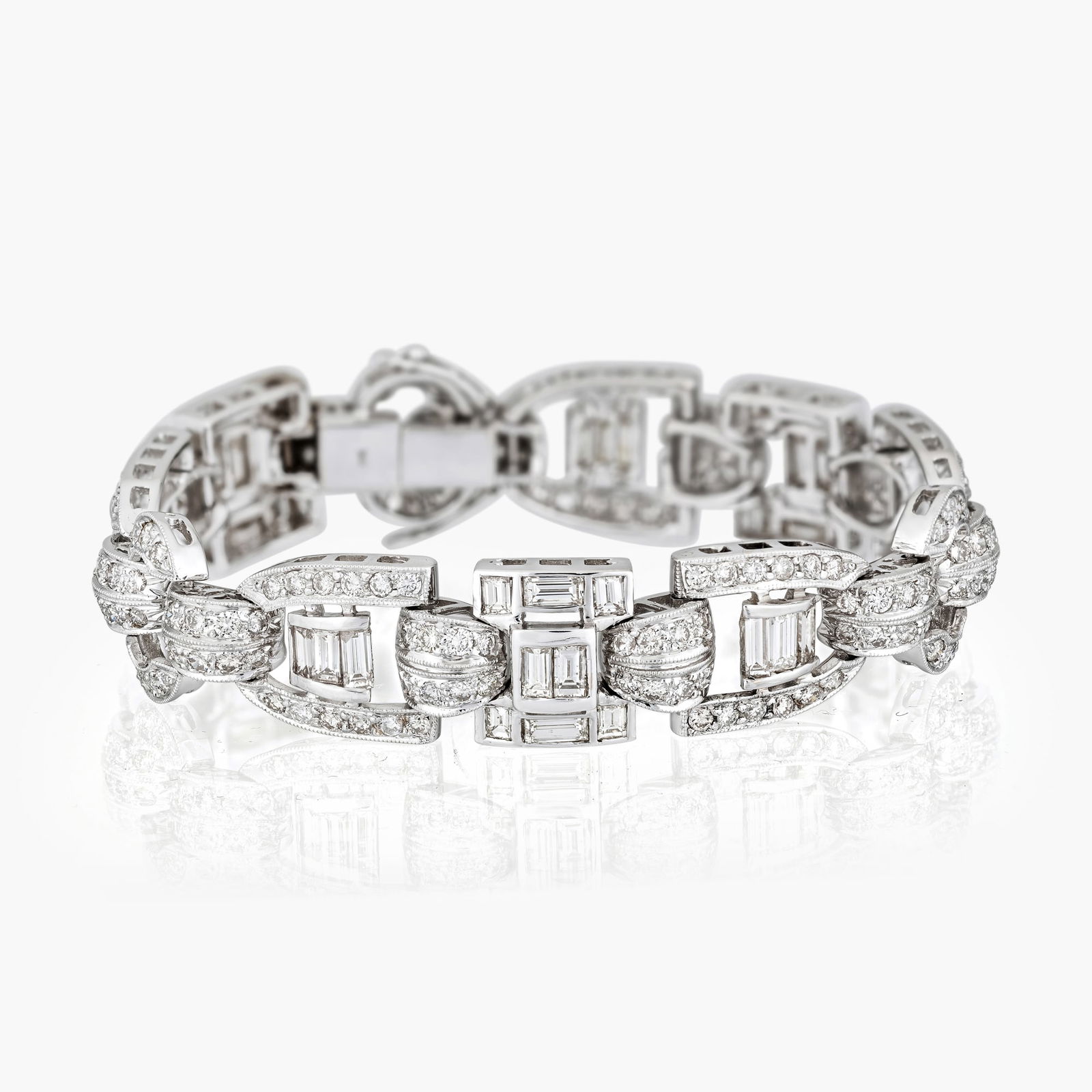 Diamond Gold Bracelet: Origin: ContemporaryMetal: 18K white goldGemstones: Round brilliant and baguette cut diamonds approx.10.00 carats total, most G-H/VS-SIMeasurement : 7inches longWeight: 37.3 gStamped: 750Condition:
