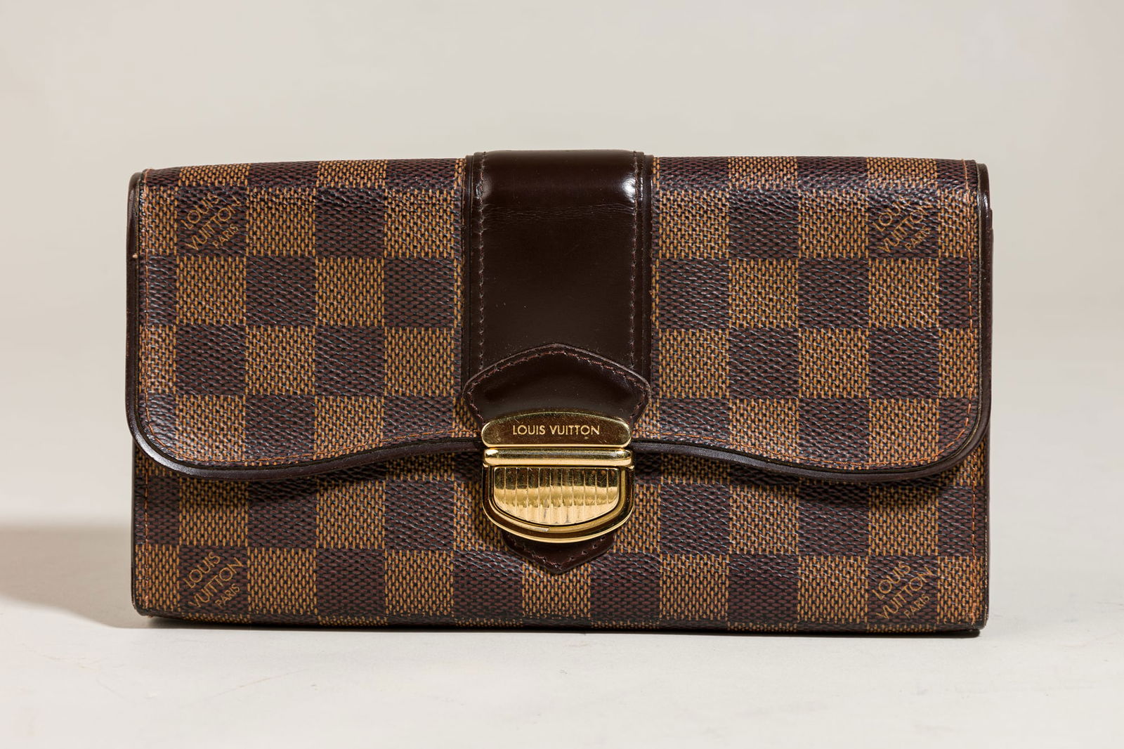 Louis Vuitton Damier Portefeuille Sistina Wallet,With Box: Brand: LouisVuittonModel: Damier Portefeuille SistinaMaterial: Damier canvas leatherColor: Ebene brownDate Code: CA2099Approx. Dimensions: 8.3" L x 4.3" HHardware: Gold-toneCondition: In very good