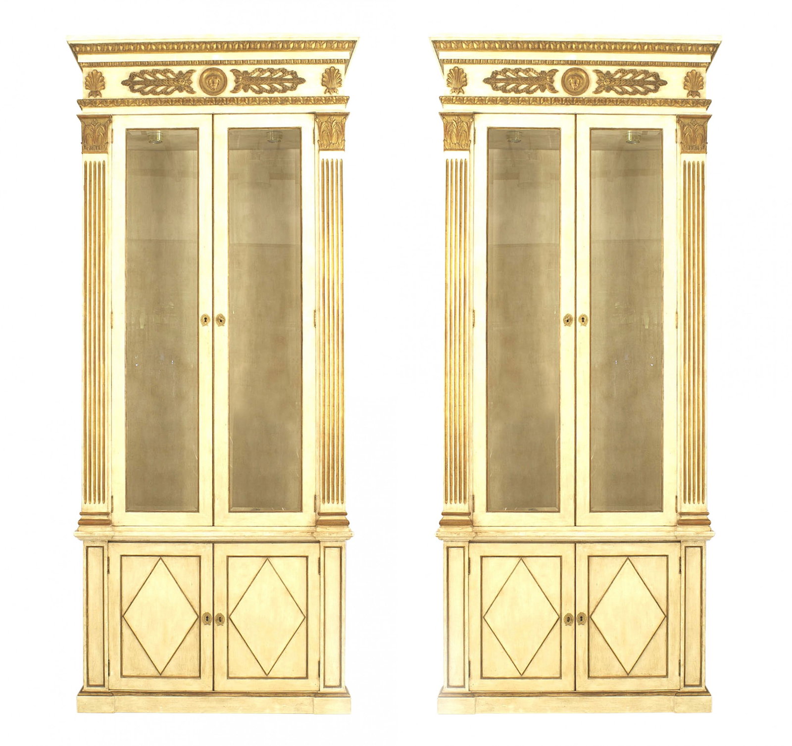 Pair of French Regence style painted biblioteques: 19th/20th c., France, grey painted and gilt trimmed bookcase cabinets, the glazed doors flanked by gilt pilasters, above 2 lower doors with a diamond design, 93"w x 15.5"d x 63.5" h