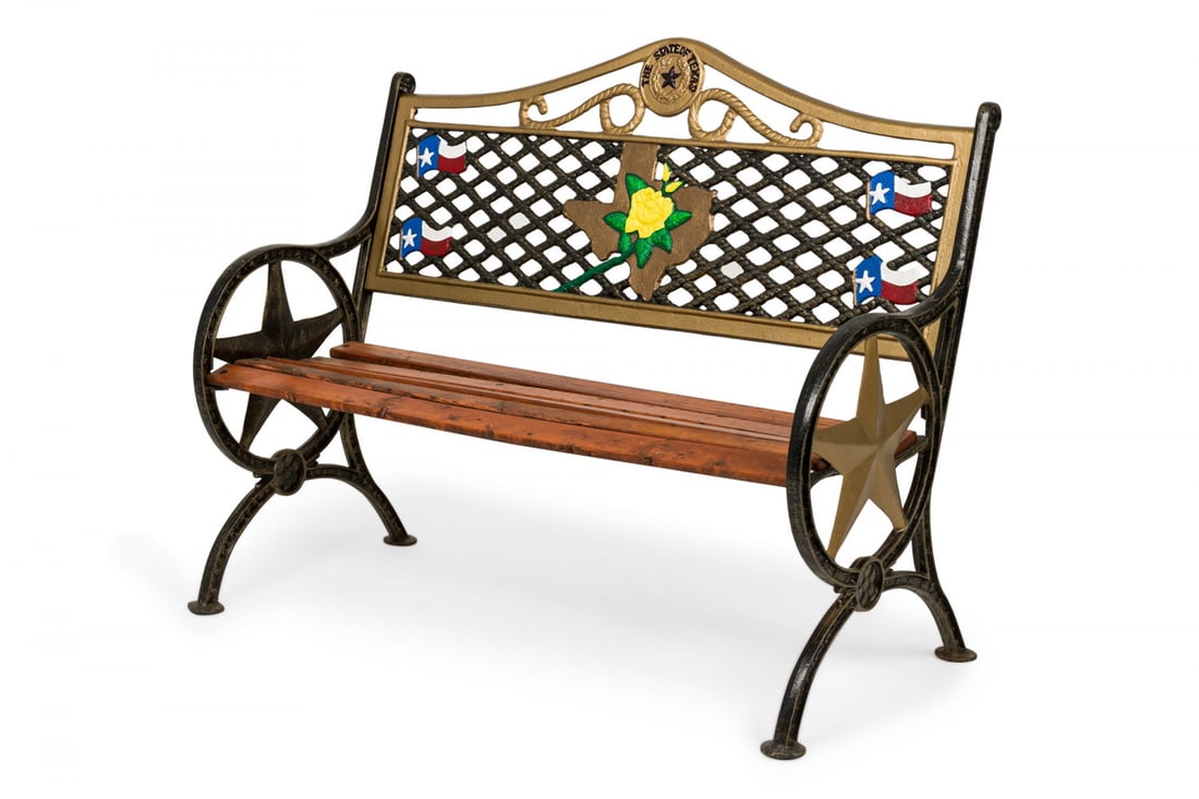 Texas theme cast iron park bench: 20/21st c., USA, polychrome painted cast iron frame, with Texas star armrests, wooden slat seat, Texas motifs including the state flag, state seal, and state outline superimposed with a yellow rose, p