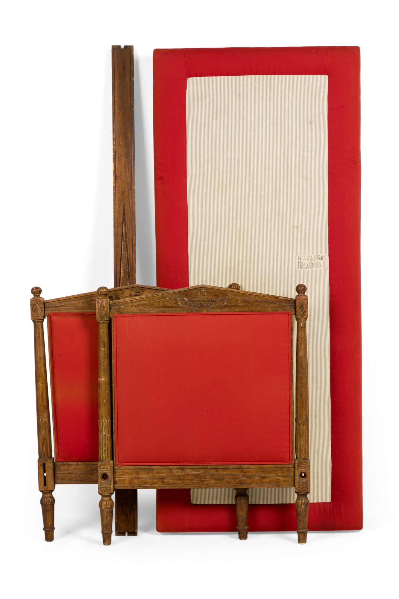 French Directoire style, red upholstered daybed: 18th/19th c., France,Beechwood frame with carved urn reliefs,, feather down padded red fabric upholstery to the headboard and footboard, down and horsehair-filled mattress, 38"h x 76"w x 31.75"d x 38"