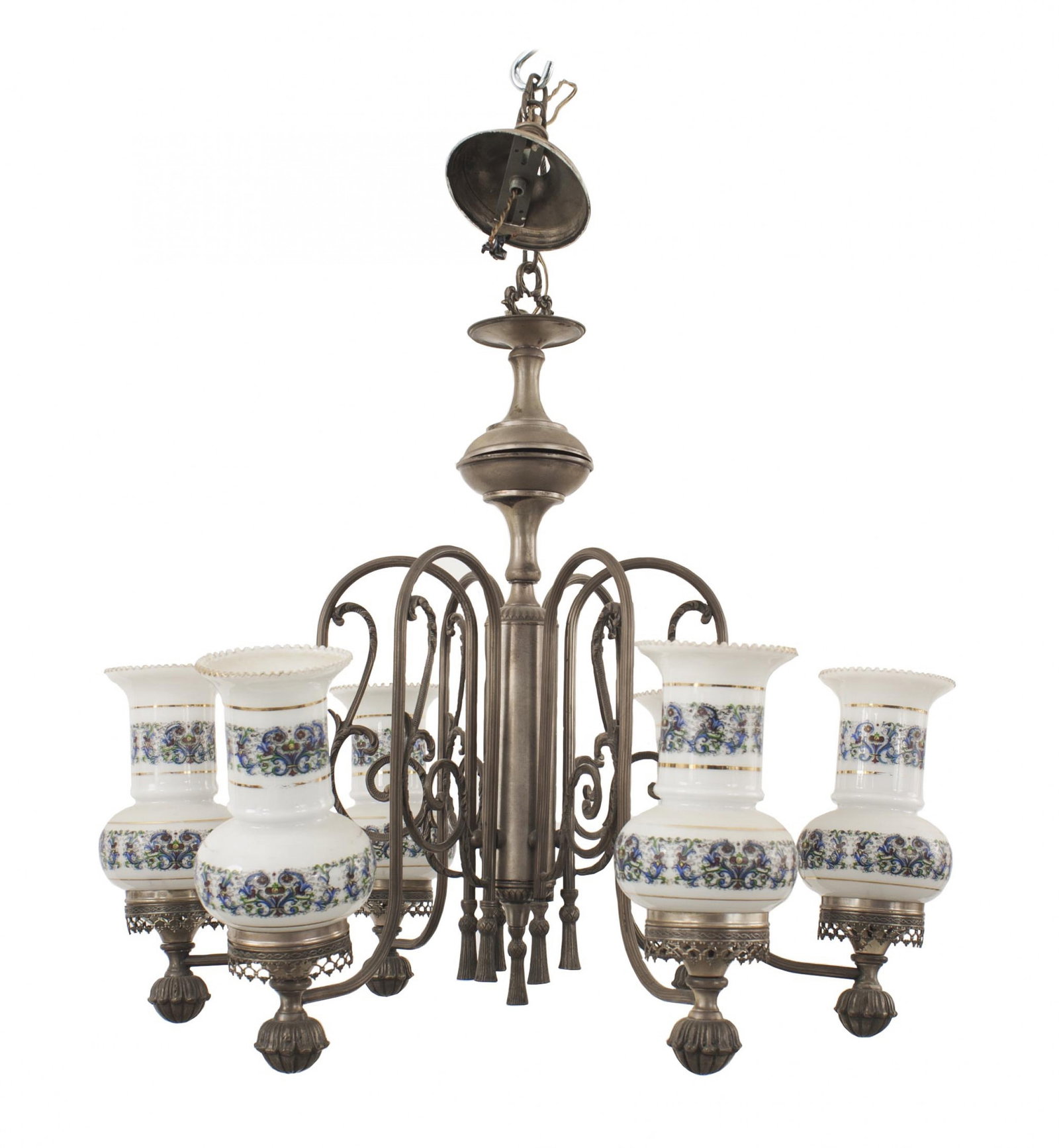 English Victorian style pewter chandelier: late 19th/20th c., likely England, patinated pewter stem ending in tassels, 6 scrolling arms, white milk glass flared shades with a ruffled floral rim, 22"h x 27"dia