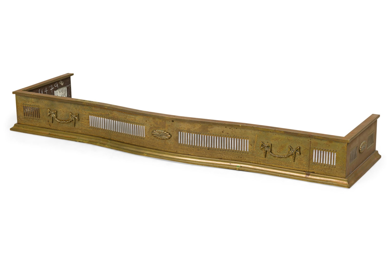 English Regency style brass fender: 19th/20th, England, bowed front with pierced grill, decorated with relief floral swags, 5.75" h x 50"w x 12.5"d