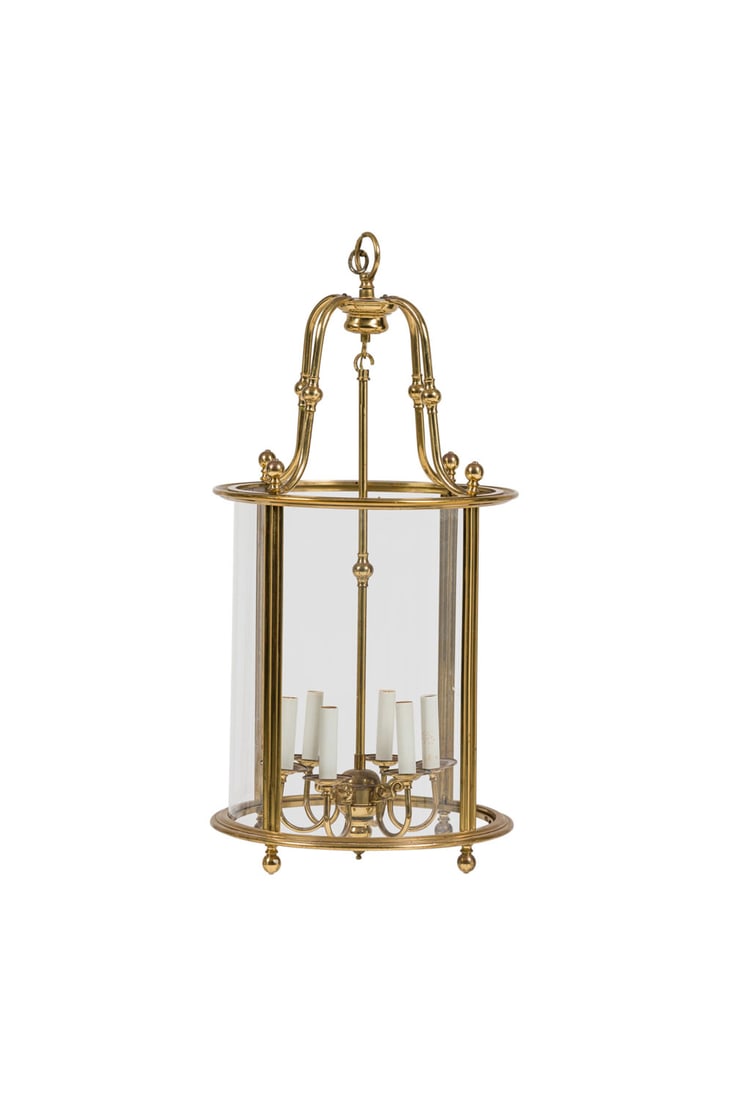 Vintage French Louis XVI style brass 6-arm lantern: mid-20th c., France, polished brass barrel shaped lantern chandelier encased in 4 rounded glass panes with 6 lights emanating from the center stem, connecting to canopy with brass chain, 33" h x 15.5"