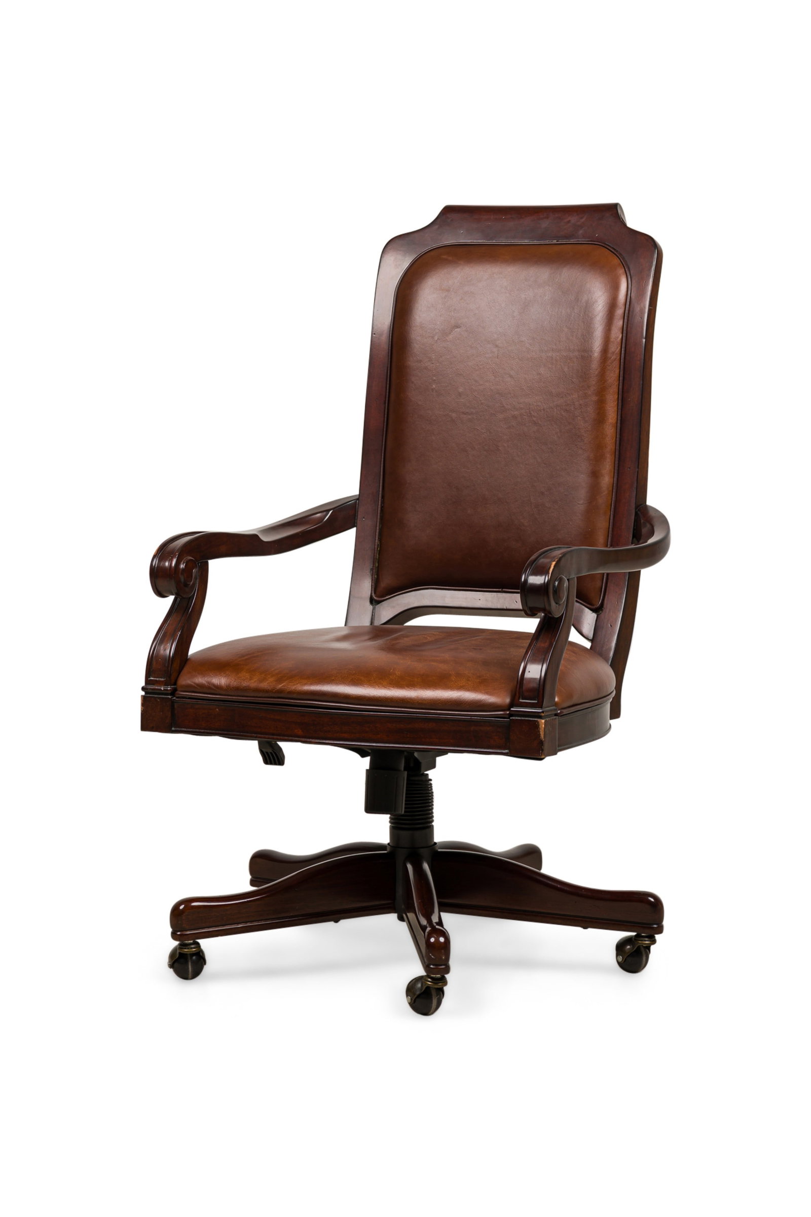 American Empire style brown swivel chair: 20th c., USA, dark stain wood, brown leather upholstery, with undulating armrests ending on slightly scalloped rotating base with casters, for Drexel Heritage BERNAY COLLECTION, 43.5" h x 24"w x 22.5"