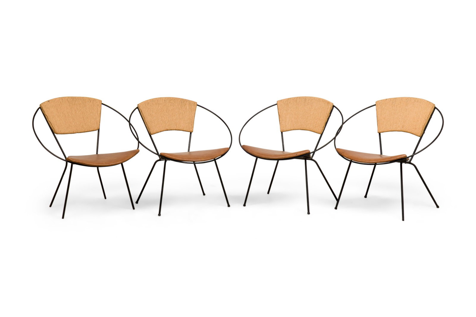 Joseph Cicchelli Attrib., (4) American Modern hoop chairs: c. 1950s, USA, patinated wrought iron hoop form frames, bias cut foam wedge seat cushion, upholstered in leather, woven rush centered panel backs, raised on thin metal legs, 29"w x 29"d x 29" h, 14"sh