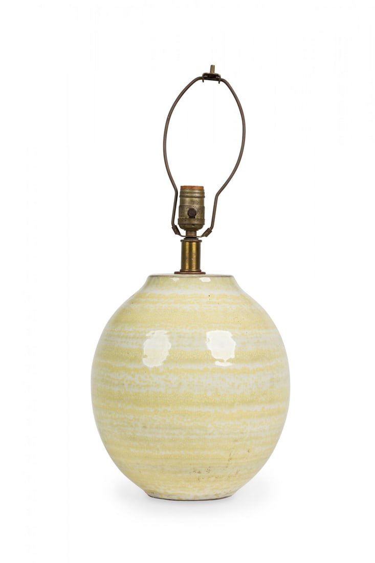 Lee Rosen for Design Technics, yellow striped table lamp: c. 1960s, USA, white and yellow glazed ceramic, in flared ovoid jar form, brass fittings, 16" h x 10"dia