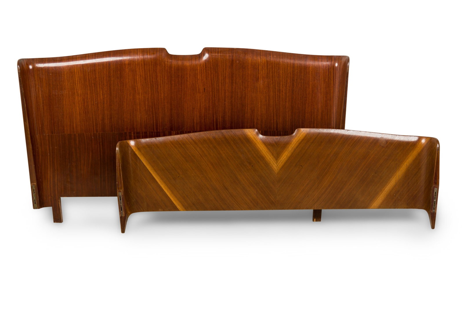 Italian Modern mahogany queen-size bed: c. 1950s, Italy, the head and footboard with shaped broken pediment top, chevron mahogany veneer, 38" h x 74"w (headboard)