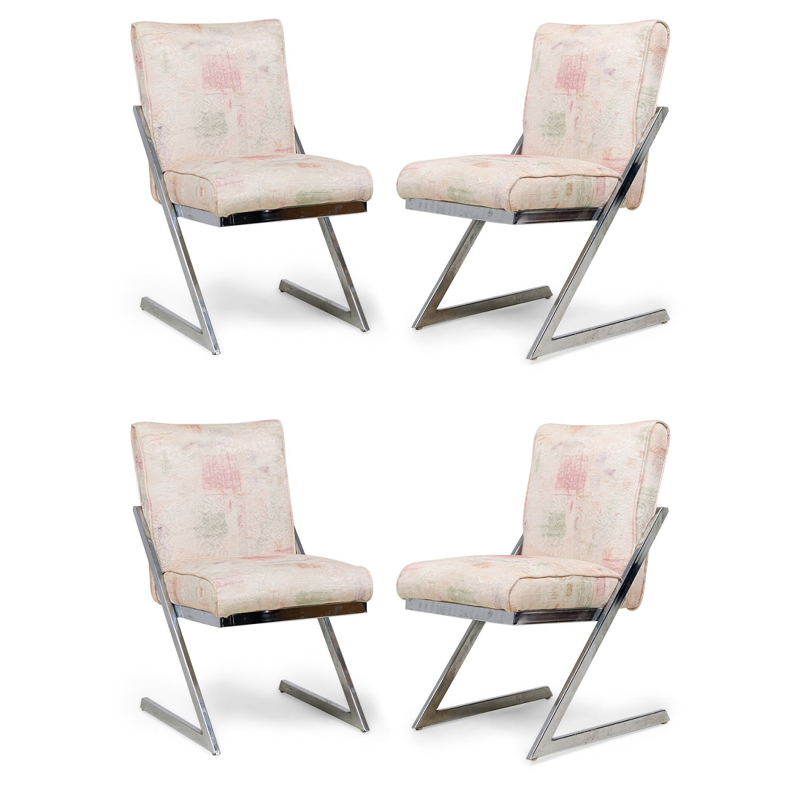 Design Institute of America, (4) upholstered chrome Z side chairs: c. 1970s, USA, cantilevered flat bar chromed steel Z shape frame, upholstered in a beige abstract patterned fabric with muted tints of brown, green and pink, 35"h x 18.5"w x 25"d, 20"h (to seat)