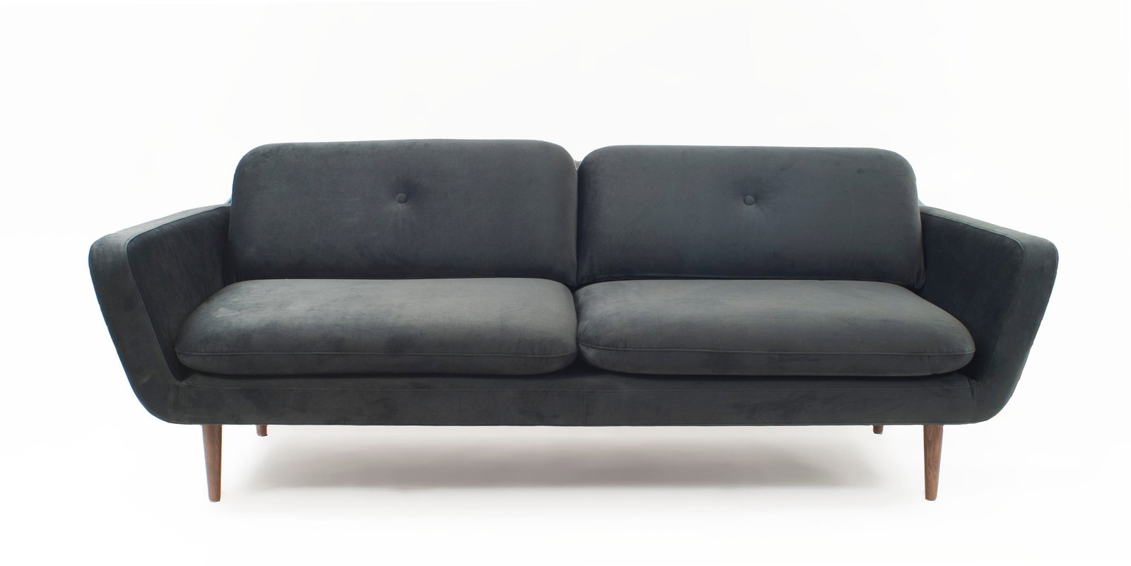 Contemporary gray velvet upholstered sofa: 21st century., USA, gondola shape, dark blue-gray velvet upholstery, two loose seat cushions, two loose back cushions with a central tufted button each, resting on four tapered walnut legs, 31"h x 86"