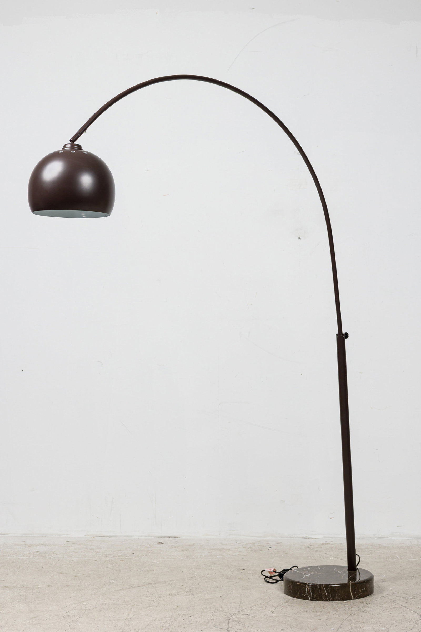Contemporary arc lamp: 21st c., Italian, brown variegated marble base, brown powder-coated metal frame, with telescoping and pivoting curved standard, high quality construction, 82"h x 50"l Provenance: Property from a Bunny