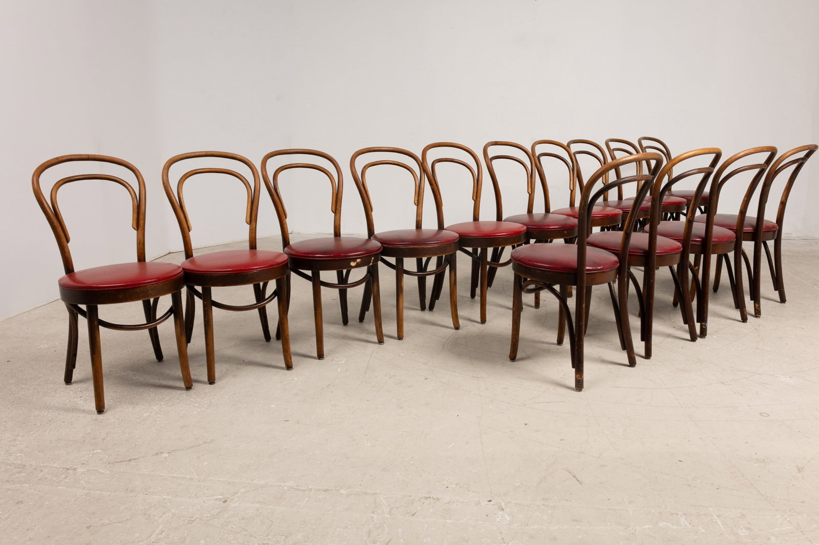 Shelby Williams, (14) bentwood bistro chairs: late 20th/21st c., USA, red leather cushion seats, maker's label on underside, 33"h x 16.5"w x 32"d, 18"h (to seat)