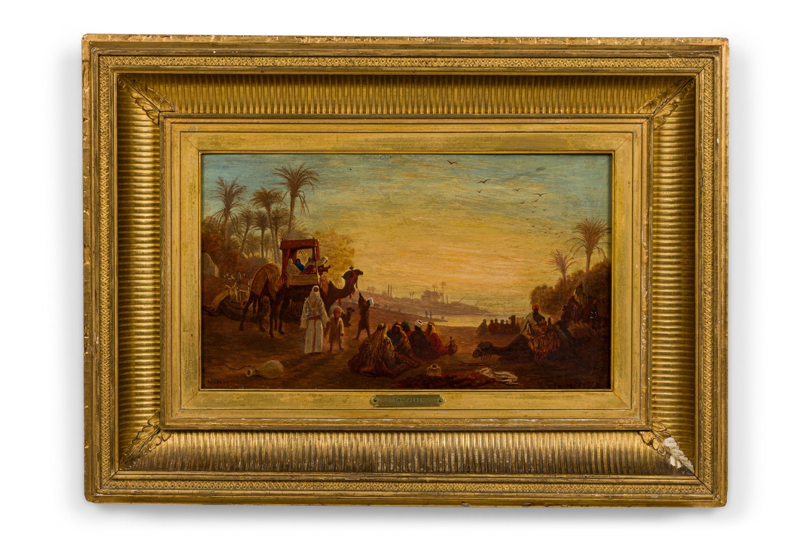 Charles Theodore Frere, Orientalist oil on millboard: Charles Theodore Frere (French, 1814-1888), "Marion",depicting a caravan scene with figures and camels by a body of water, signed lower right, inscribed "Marion" lower left,,8"