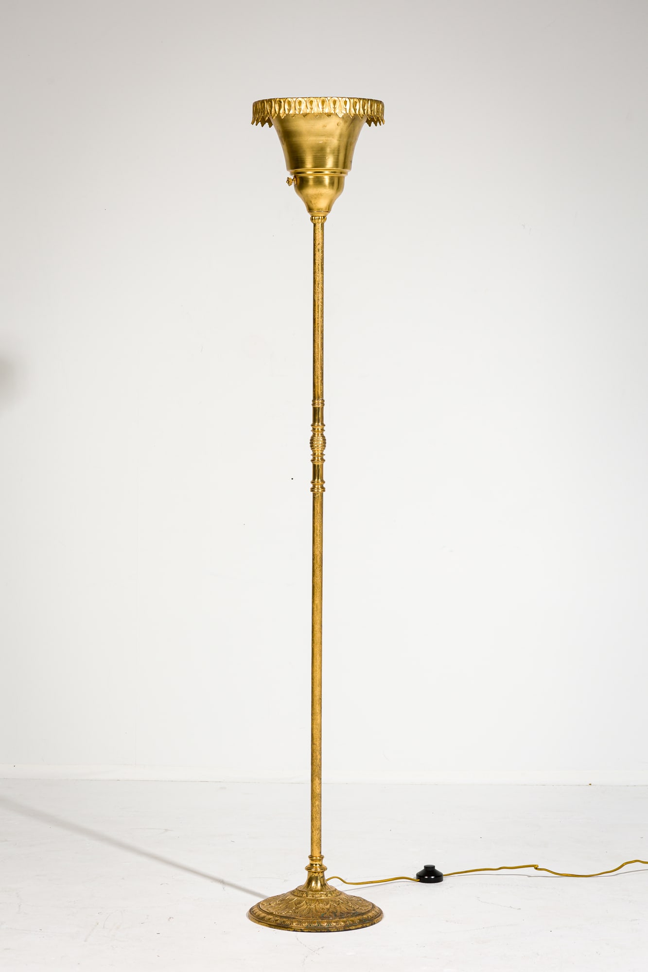 Oscar Bach for Segar Studios, gilt brass torchiere: c. 1910 , USA, cast metal, gilt brass, the urn-shaped shade with gadrooned banding, acanthus leaf relief on the base, cast signature to underside, 66" h x 11" dia Property from 502 Park Ave: