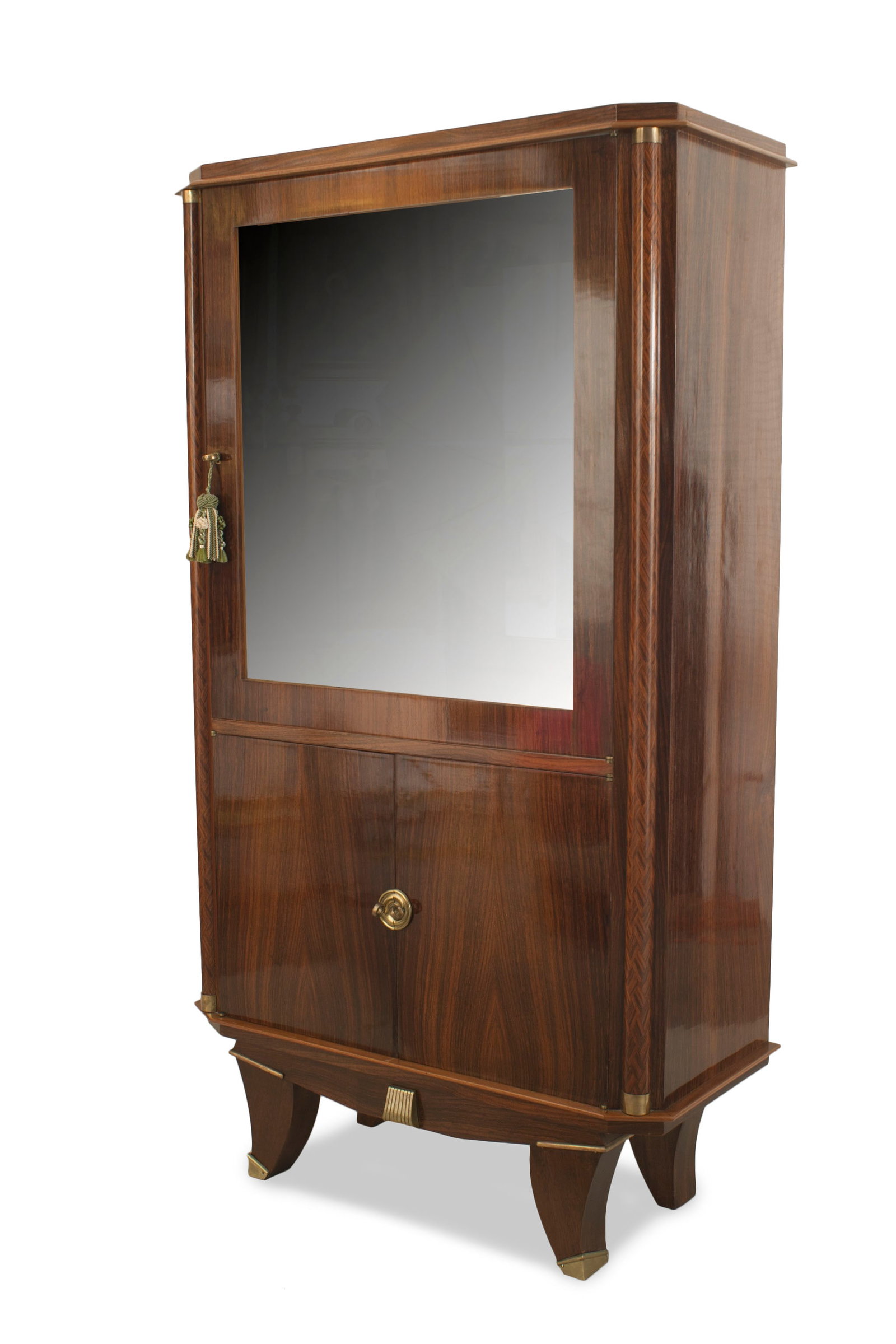 Maurice Rinck (manner of), French Art Deco vitrine: 20th c., France, vertical rectangular form, palisander wood veneer, flanked by geometric inlaid round column sides, upper cabinet with a glass door, mirrored glass backing, and an interior glass 