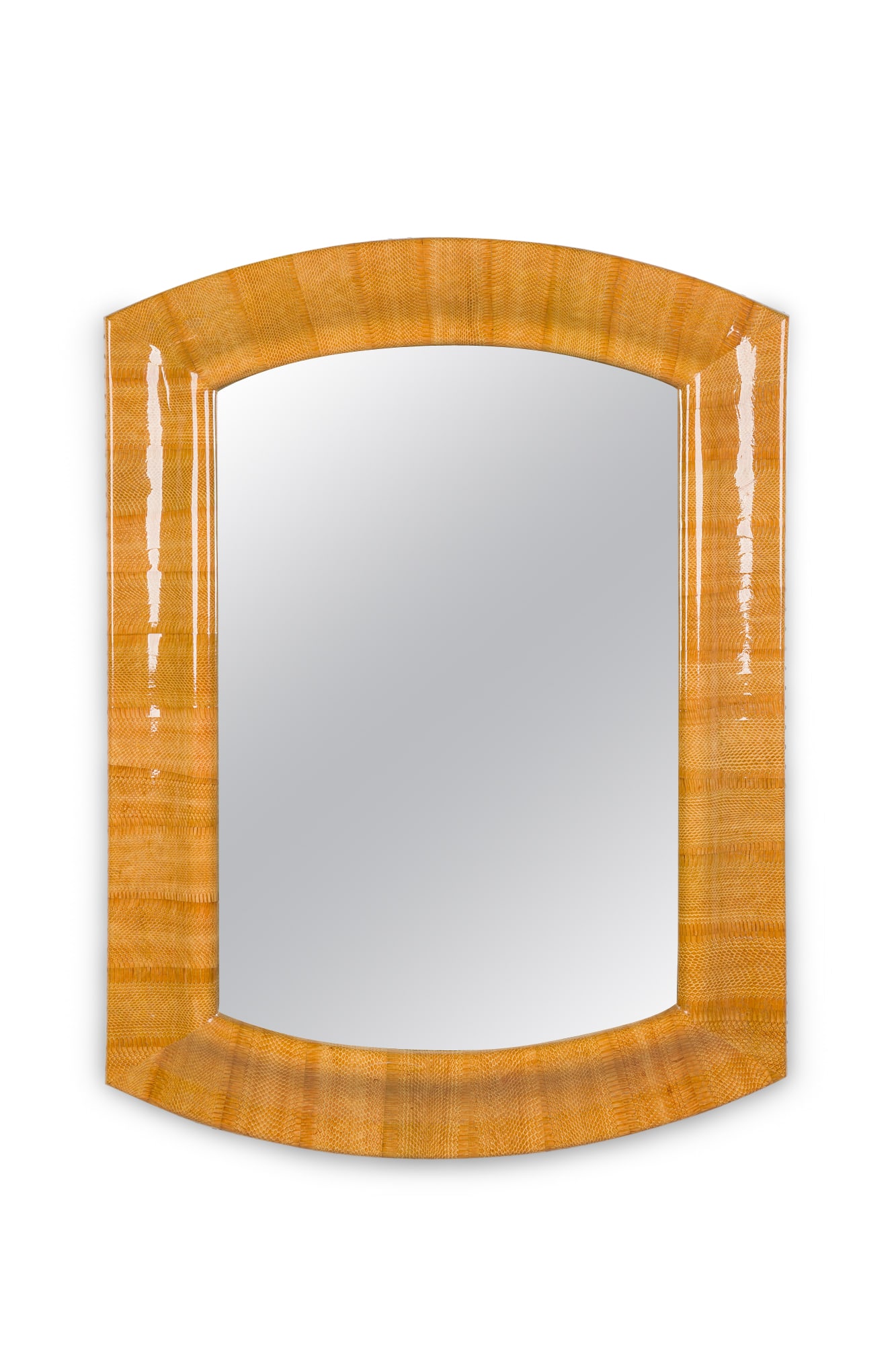 Karl Springer, snakeskin clad wall mirror: c. 1980, USA, of rectangular form with curved top and bottom,clad in a light brown faux snakeskin leather, 46.5"h x 34.5"w x 1.5"d Category: Wall Mirrors