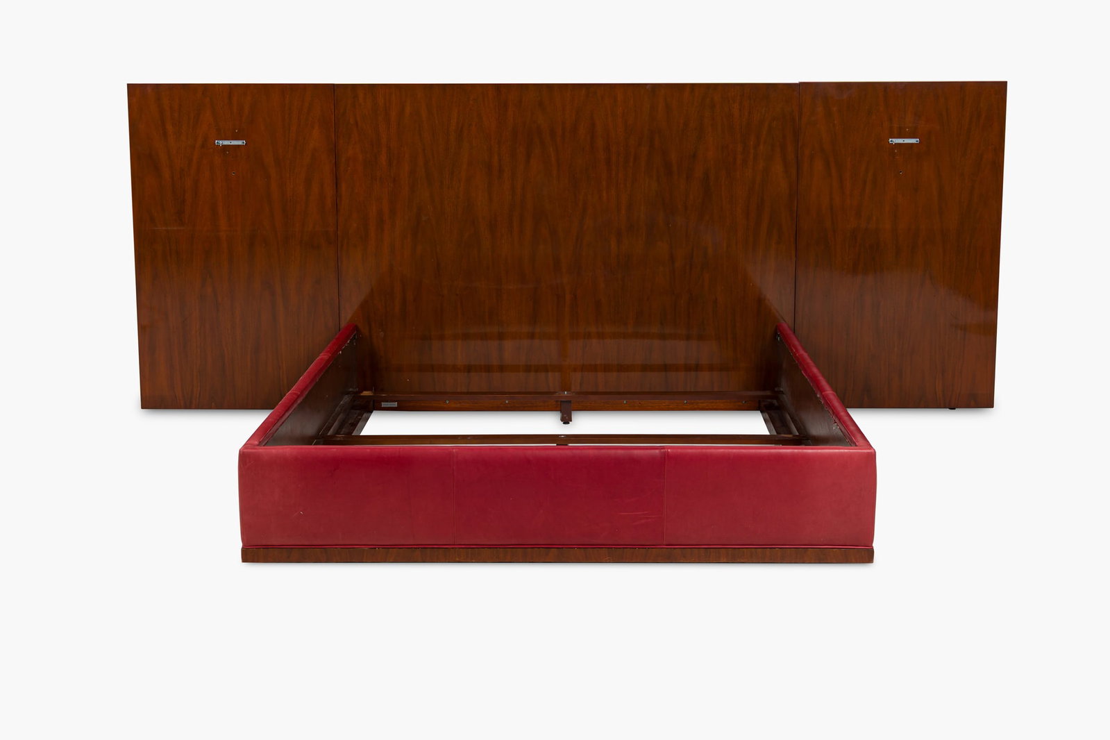 Ralph Lauren Home, 'Modern Hollywood' queen size bed frame: 20/21st c., USA, mahogany frame with footboard and support rails upholstered in red leather, later added iron brackets, 49"h x 65.5"w x 86"d Provenance: Property from 502 Park Ave: A St