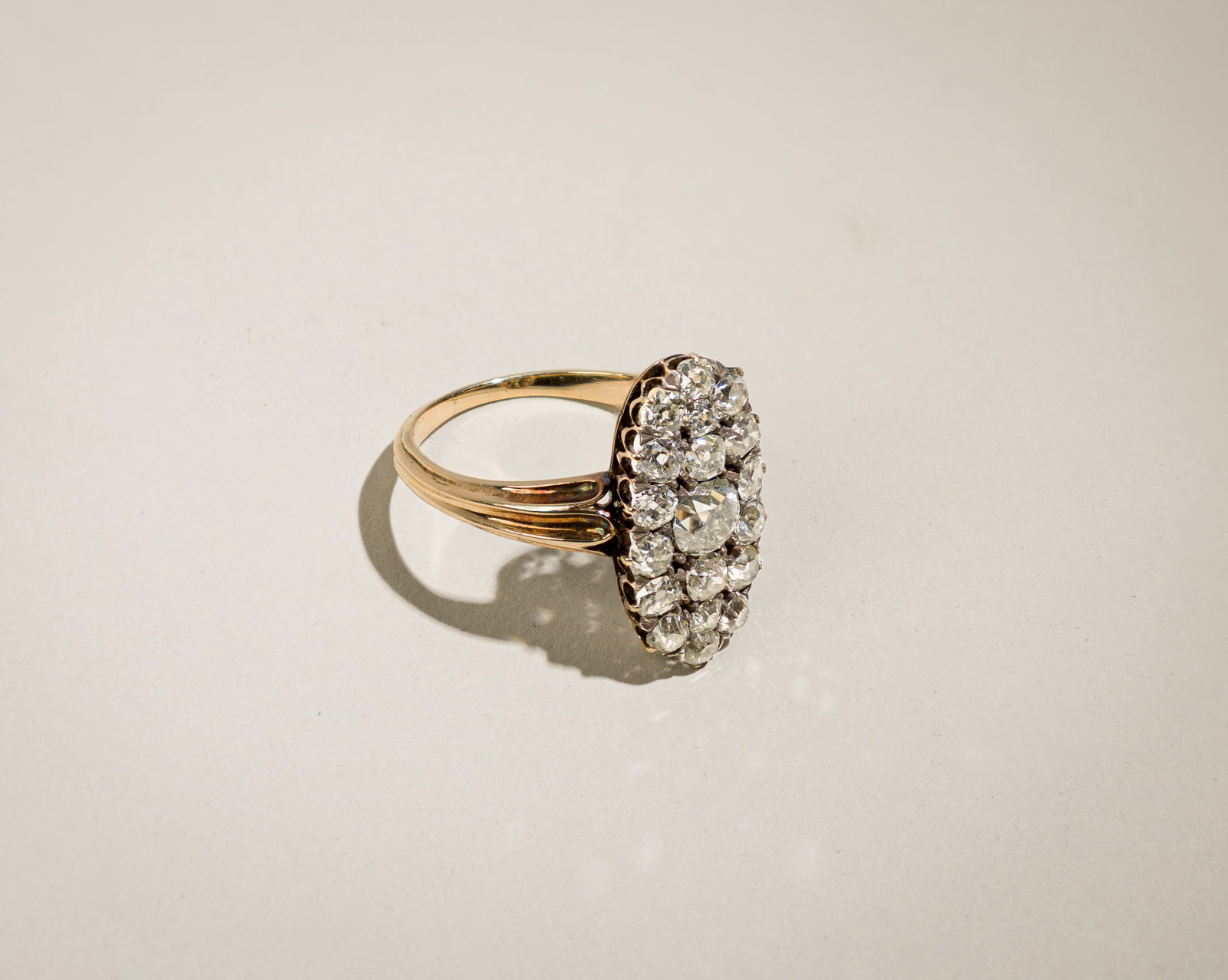 Victorian Cluster Diamond Ring: Origin: Victorian Metal: Silver/ 18K yellow gold Gemstone(s): Old-Euro diamonds approx. 1.82 carats total, most H-I/SI Measurements: 20 mm long Ring size: 8 Weight: 4.5 g Condition: In very good condi