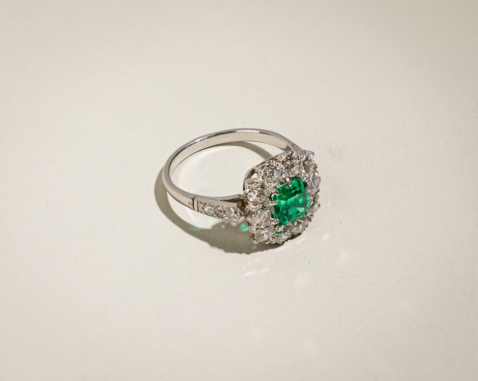Columbia Emerald No Oil And Diamond Ring, Gubelin Cert: Origin: Contemporary Metal: Platinum Gemstone(s): Emerald cut emerald 0.97 carats Columbia no-oil Gubelin#23052006; Old-Euro cut diamonds approx. 1.12 carats total, most F-G/VS-SI Measurements: 13 mm 