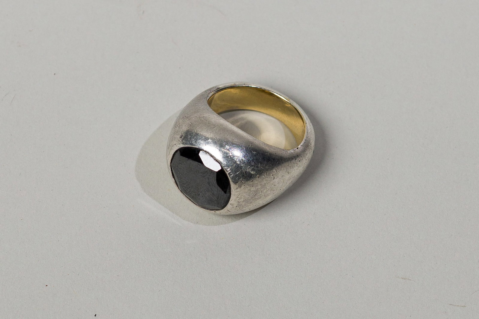 Black Diamond " Gypsy" Ring: Origin: Contemporary Metal: Silver on yellow gold Gemstones: Round brilliant cut black diamond approx.7.50 Ct Measurements: 3/4 inches on top Weight: 31.5 g Ring size: 10 Condition: In good condition.