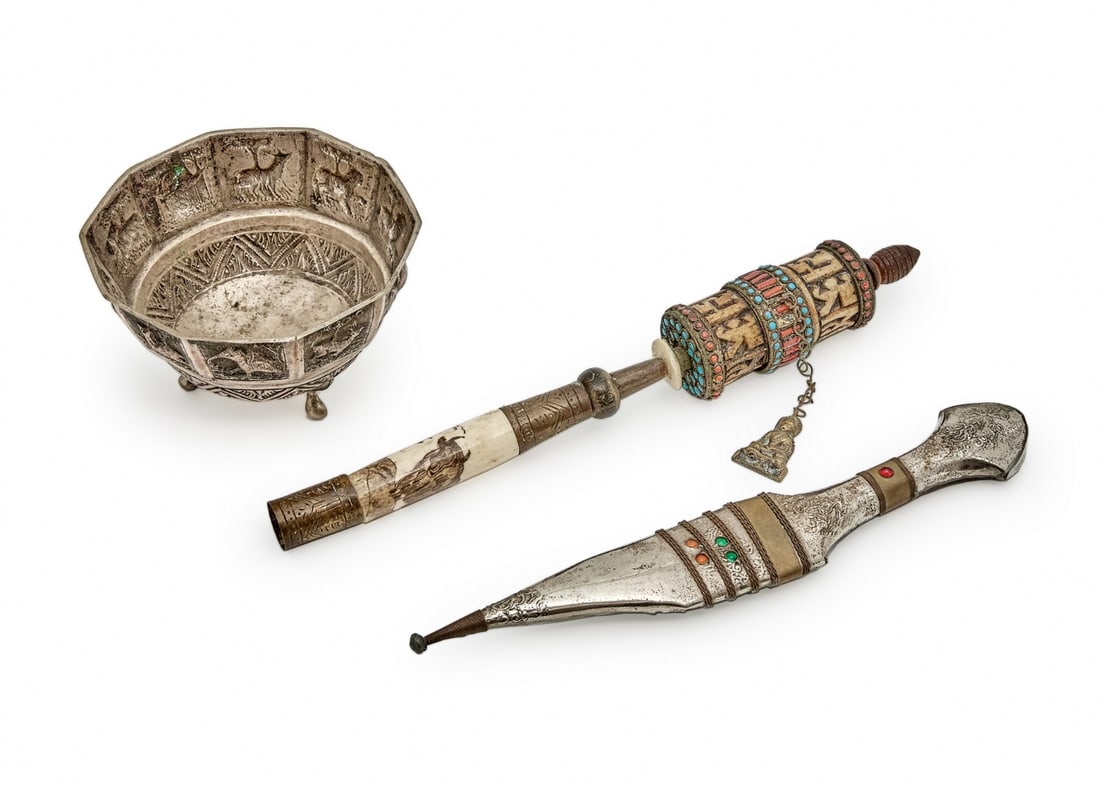 Three Decorative Objects: Three Decorative Objects, antique Indian bowl, hand-hammered copper, silver-plated Width: 13 cm, Height: 8 cm Tibetan prayer drum, length: 30 cm Dagger-shaped decoration, metal, silver-plated, length: