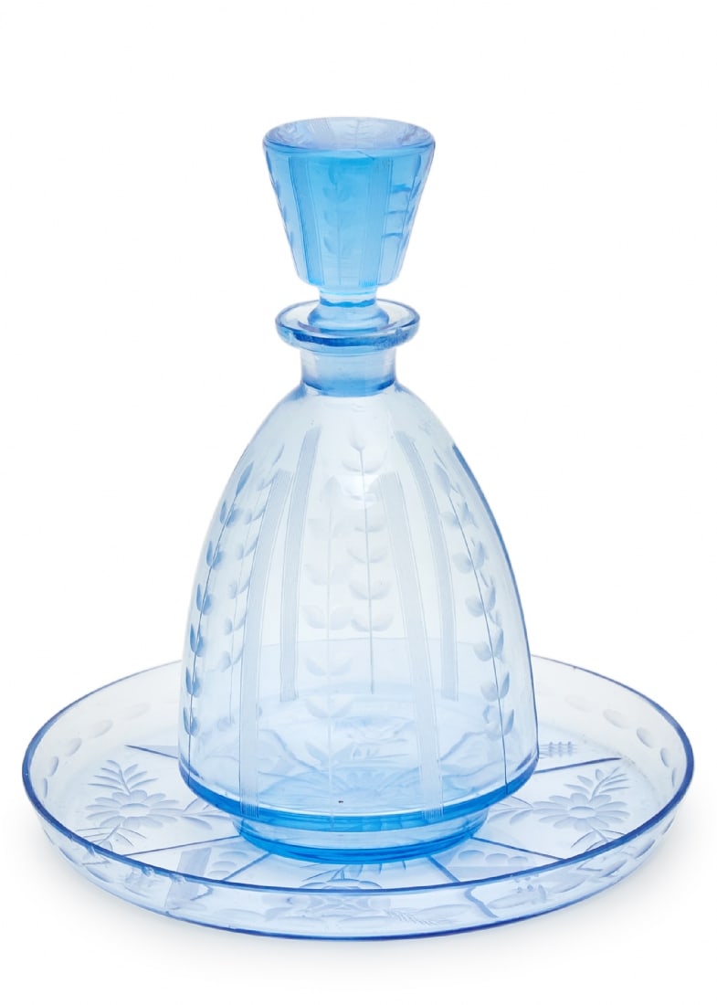 Set of Blue Engraved Glass Liquor Bottle with Matching Plate: Set of Blue Engraved Glass Liquor Bottle with Matching Plate, bottle height: 23 cm including the lid Plate diameter: 21 cm Small chips on the plateNotice: We are located in Israel and provide full pac