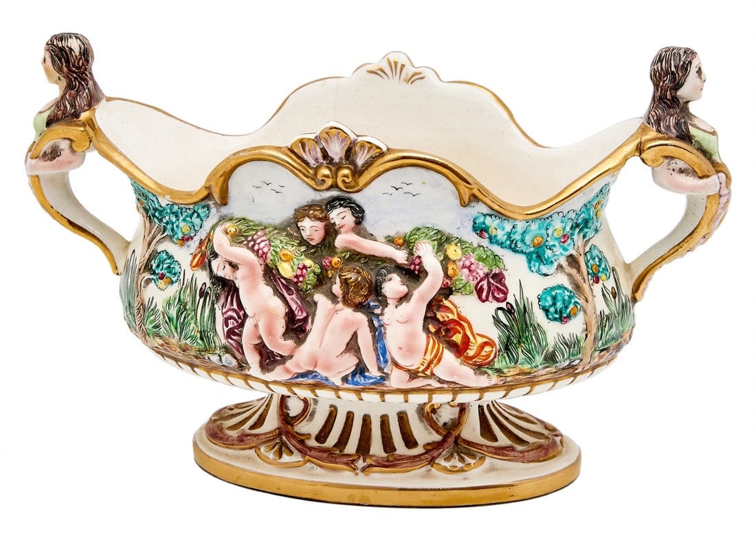 Italian Centerpiece by Capodimonte, Made of Ceramic in Neo-Renaissance Style: Italian Centerpiece by Capodimonte, Made of Ceramic in Neo-Renaissance Style, decorated with hand-painted enamel and gold reliefs, signed Length: 30 cm Width: 16 cm Height: 20 cmNotice: We are located