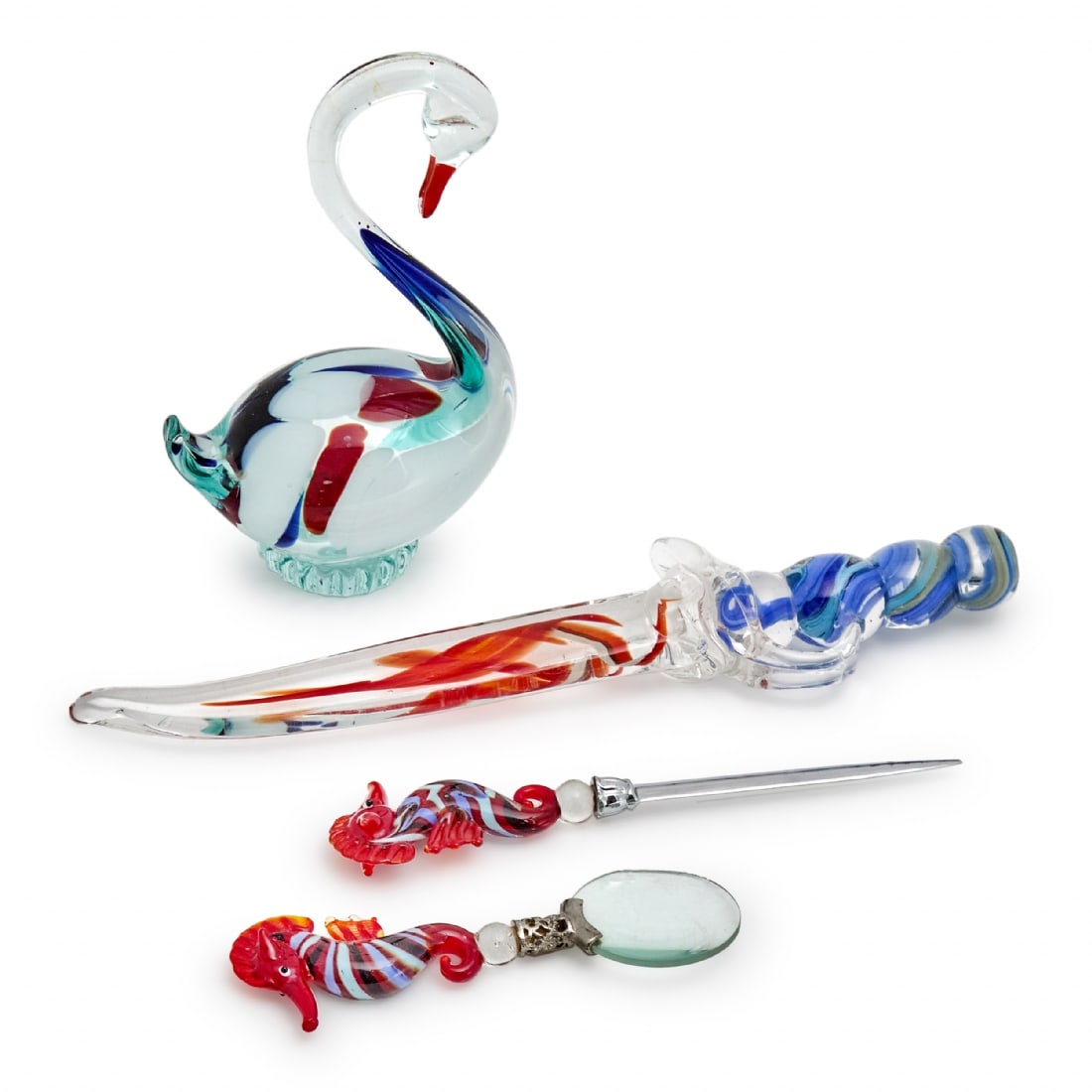 Four Italian Decorative Objects Made of Glass (Murano): Four Italian Decorative Objects Made of Glass (Murano), length of the sword: 30 cm Paint peeling on the swan Defects in the seahorse letter opener setNotice: We are located in Israel and provide full
