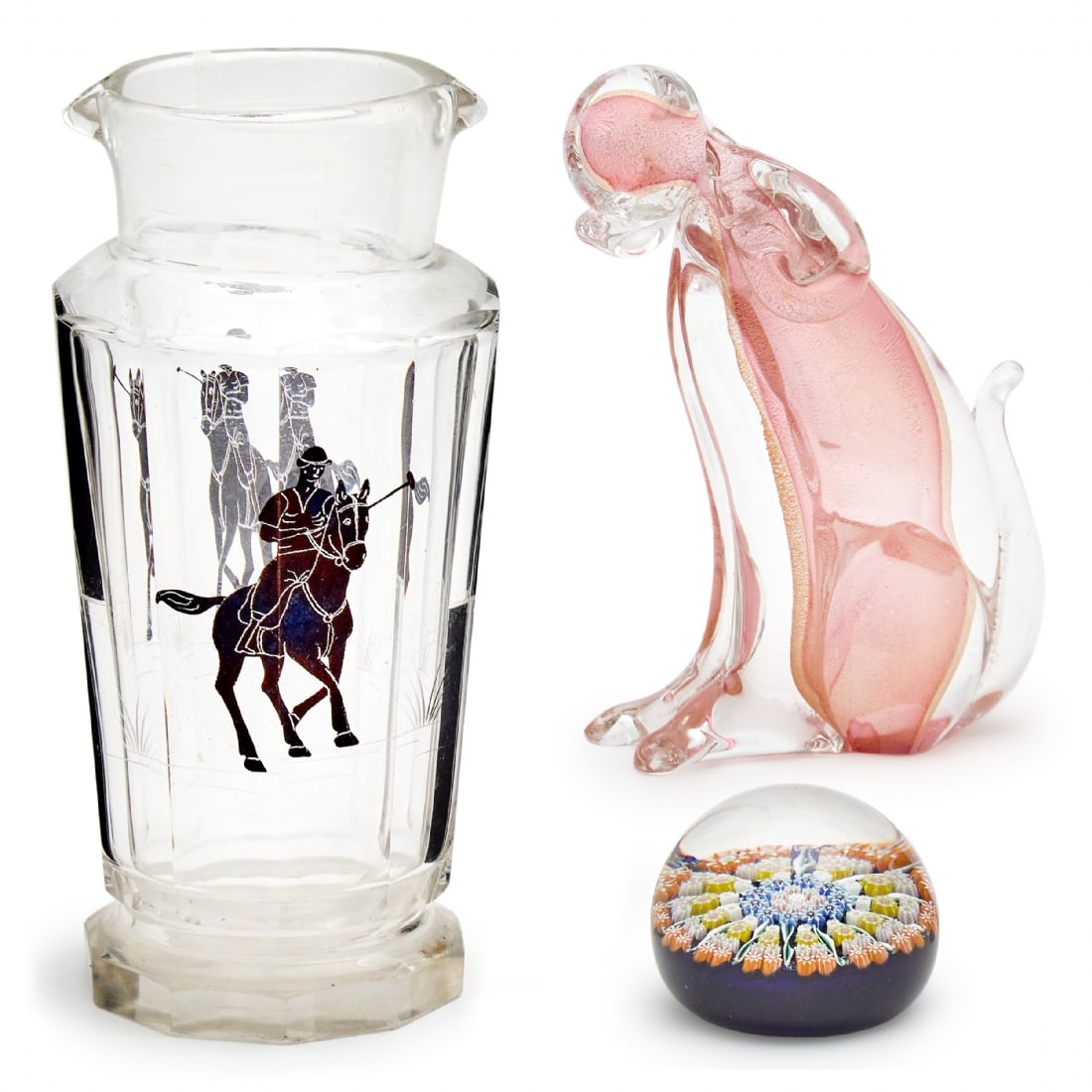 Three Glass Objects: Three Glass Objects, art Deco decanter adorned with a polo rider figure, height 22 cm Millefiori paperweight, diameter: 6.5 cm Venetian figurine of a pink poodle, height: 17 cmNotice: We are located i